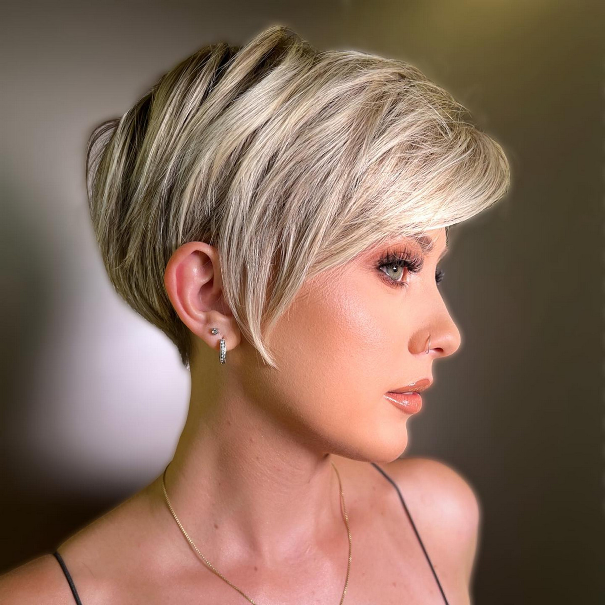 Choppy Blonde Cut with Side Bangs
