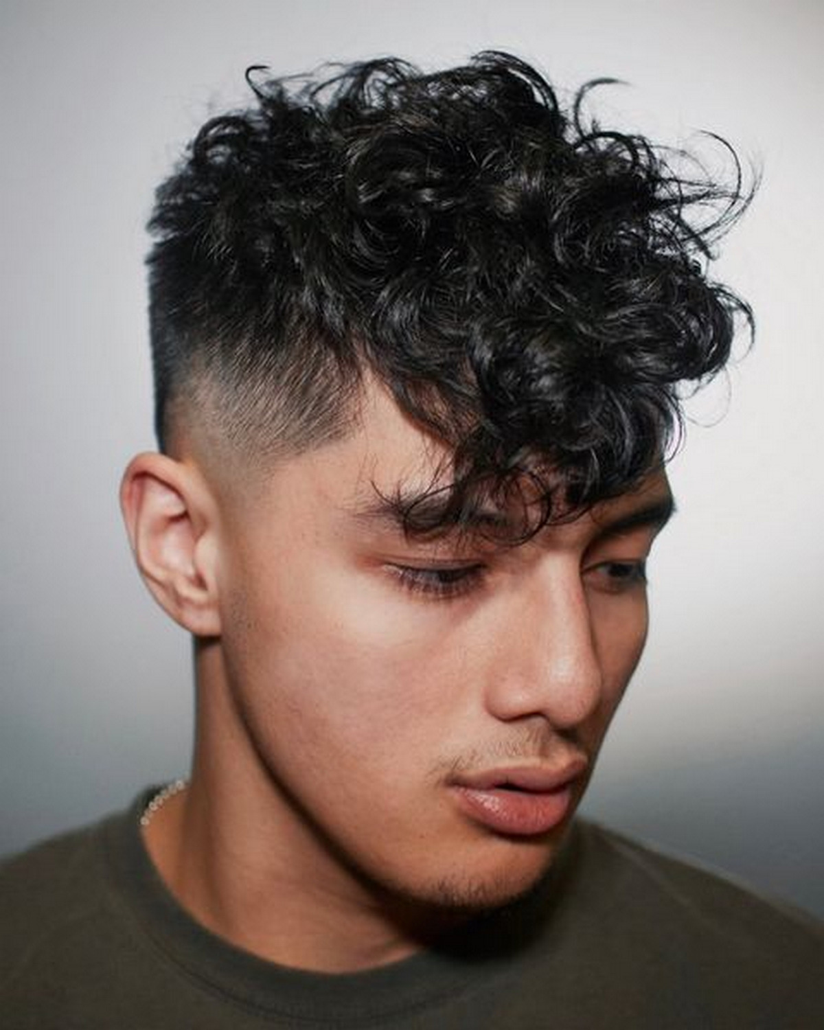 Hight Fade Taper With Curl Bangs
