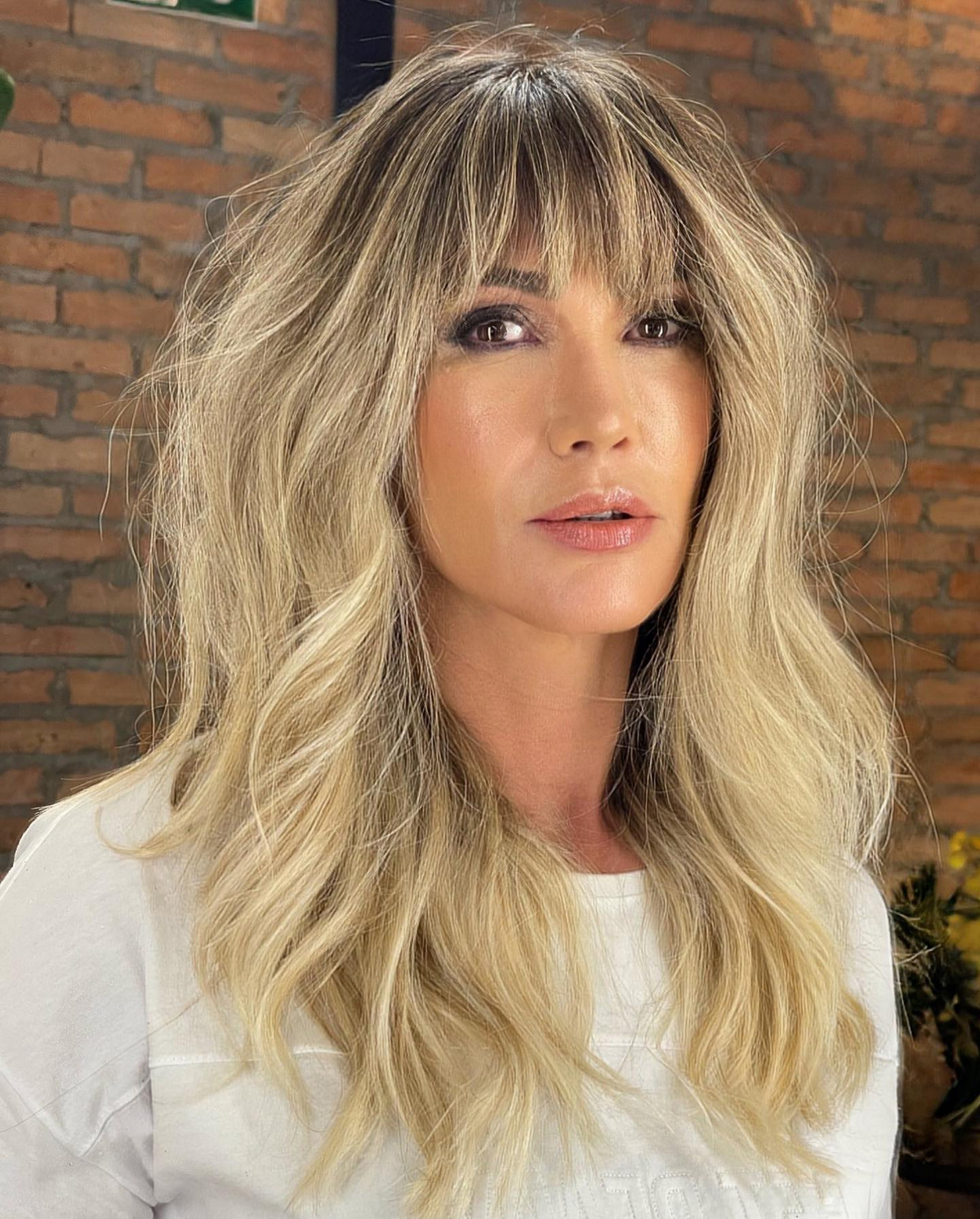 Blonde Balayage and Full Textured Bangs