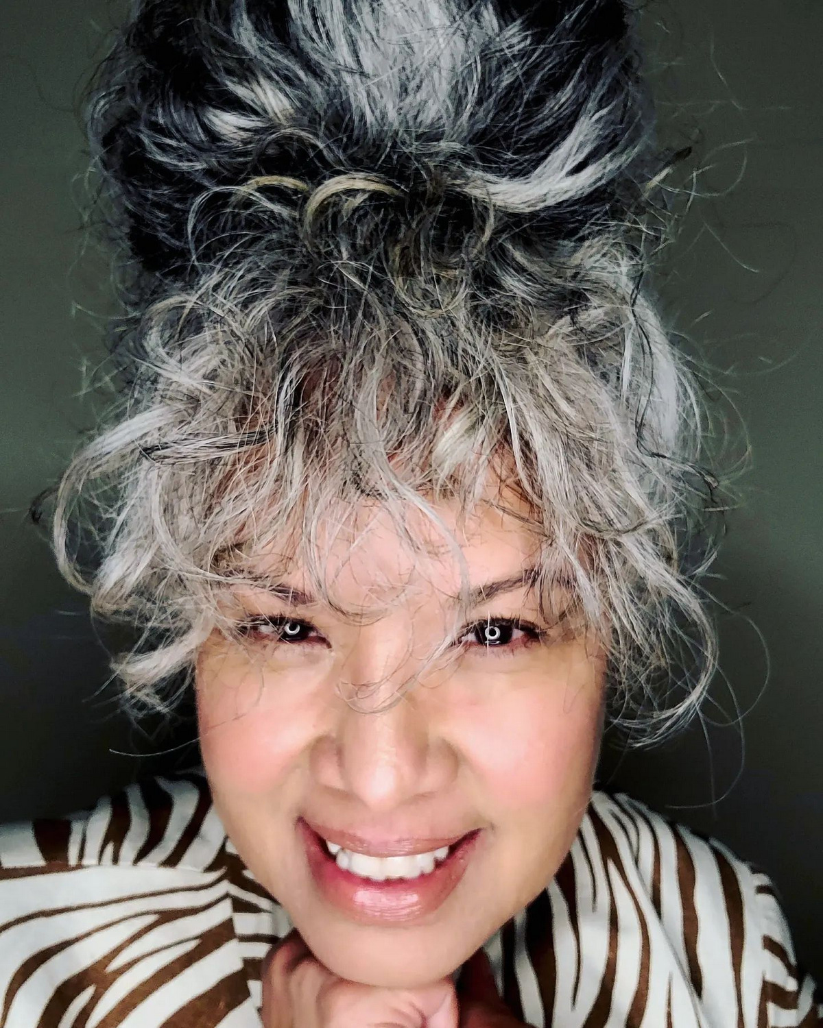 High Messy Bun on Silver Hair