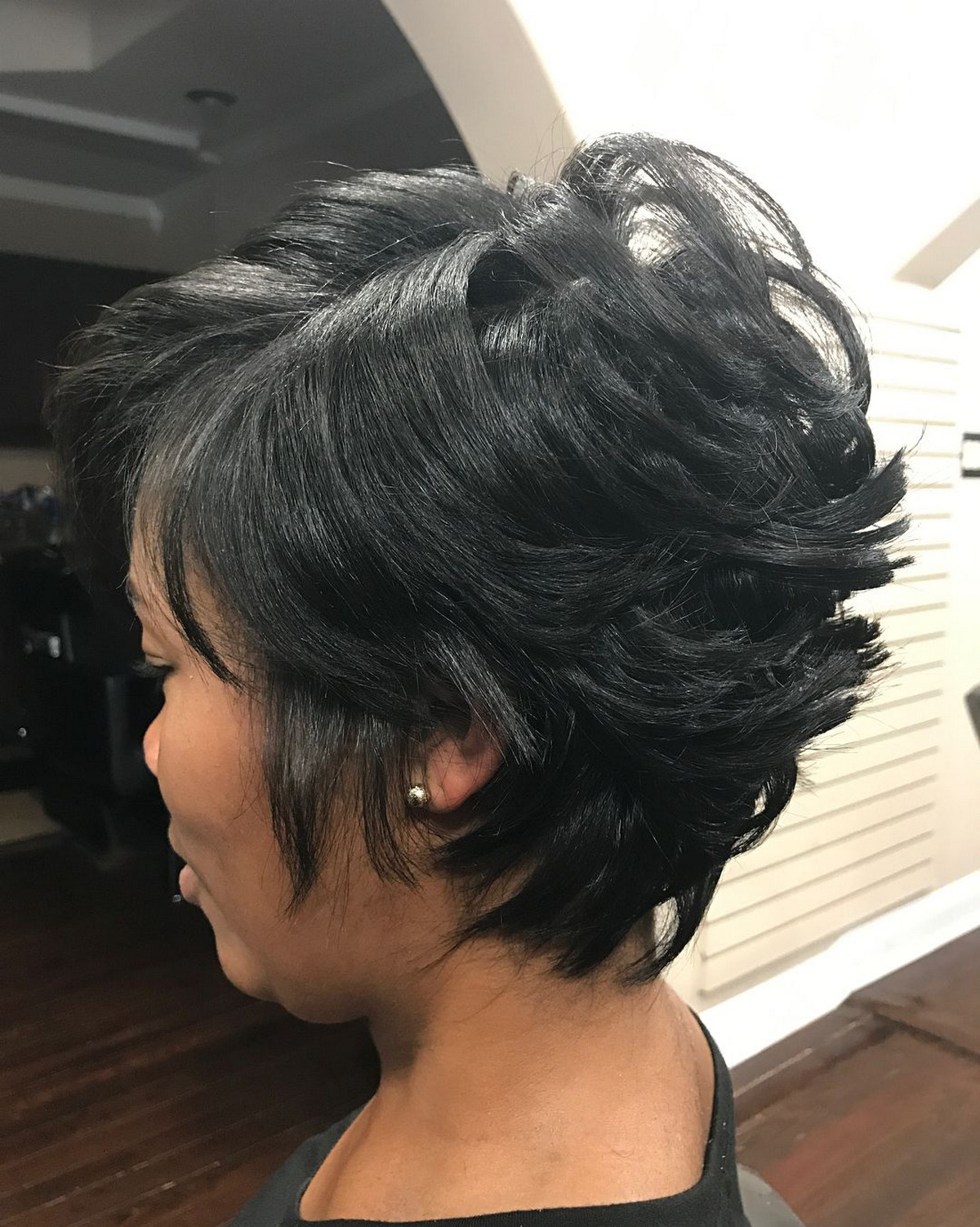 Long Black Pixie With Swept Back Layers