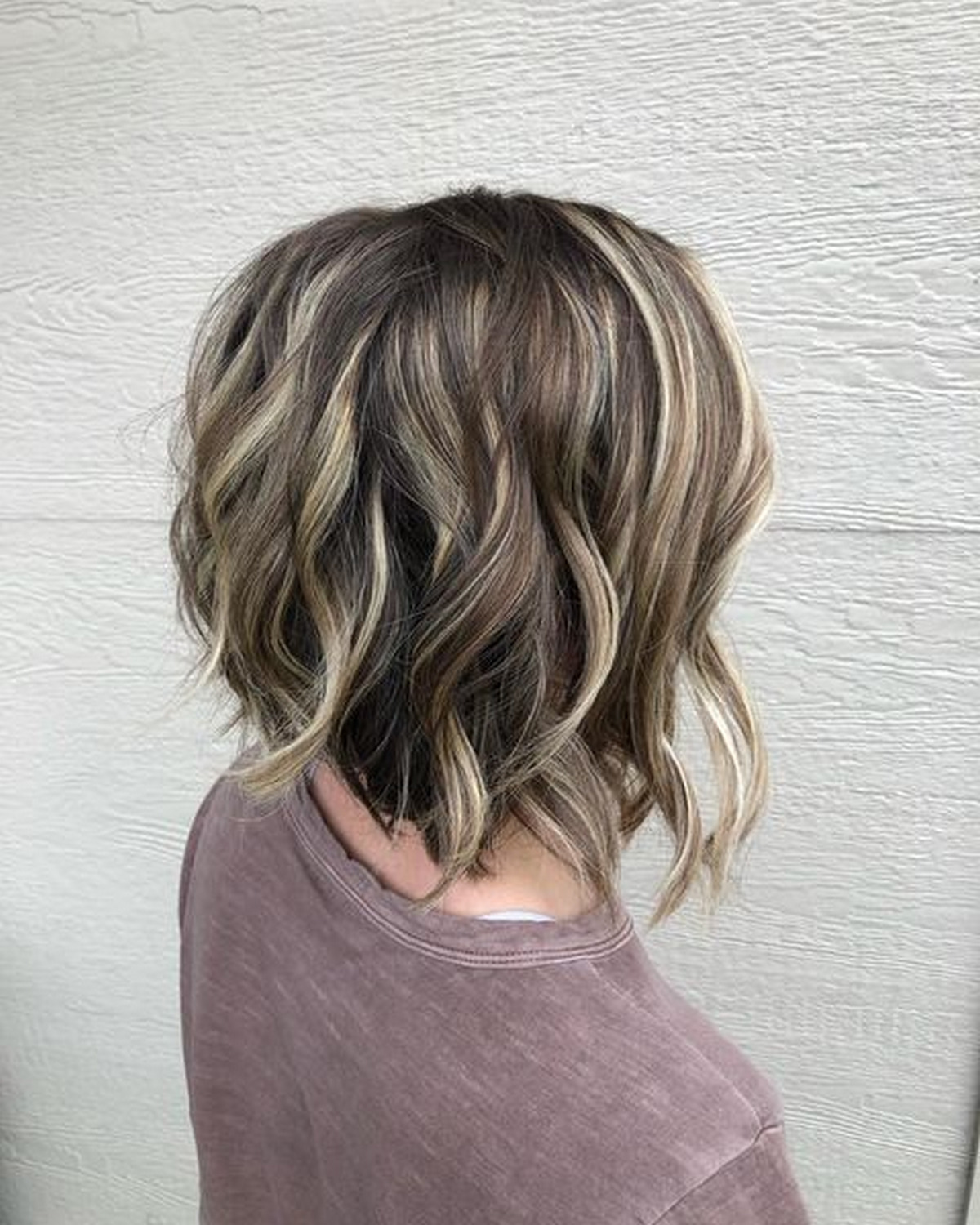 Inverted Brunette Bob With Feathered Highlights