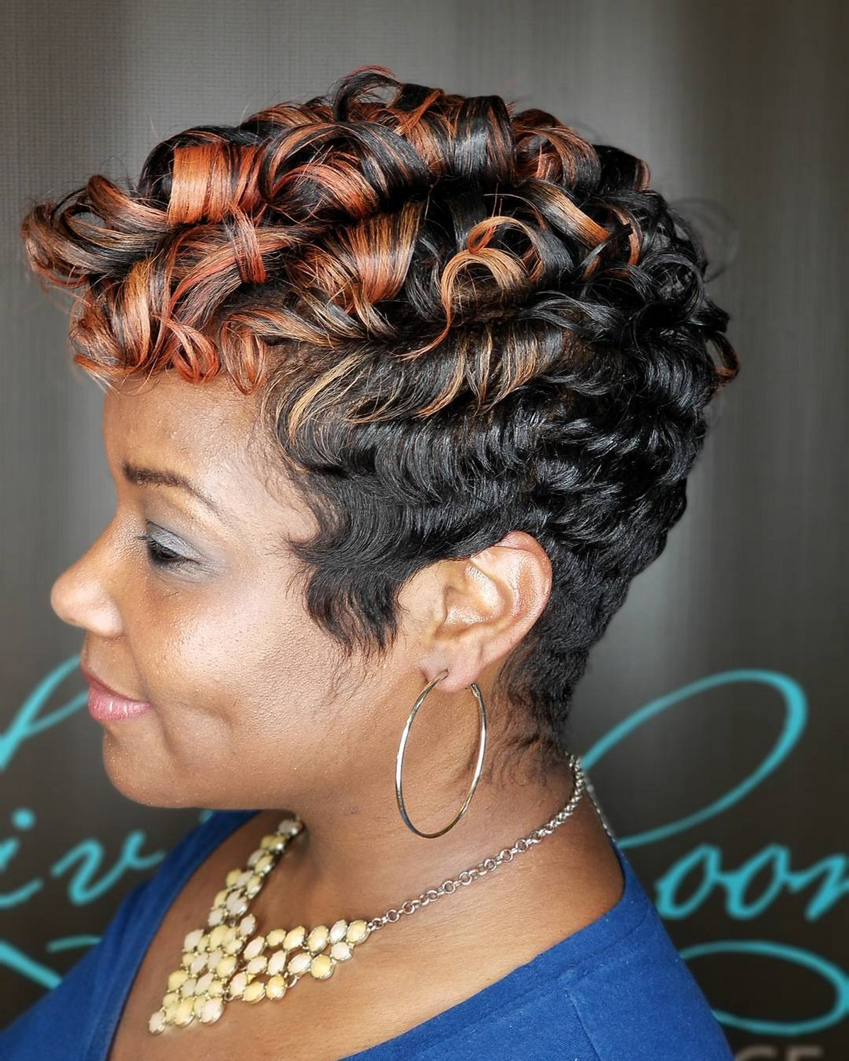 Short Curly Hairstyle With Caramel Highlights