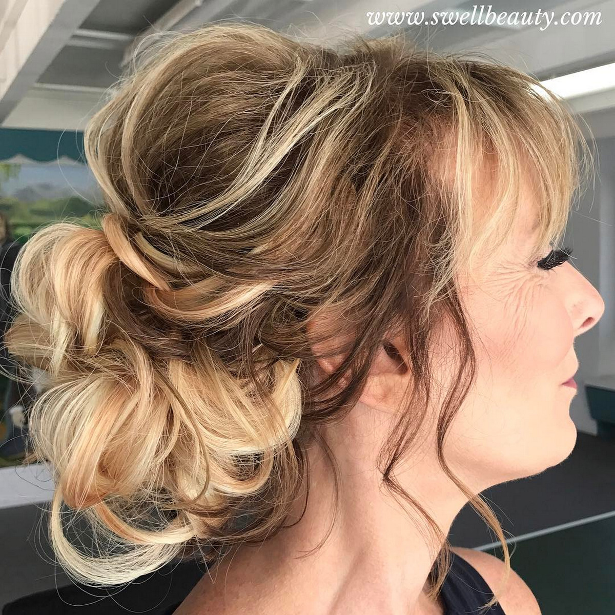 Messy Bun with Romantic Strands