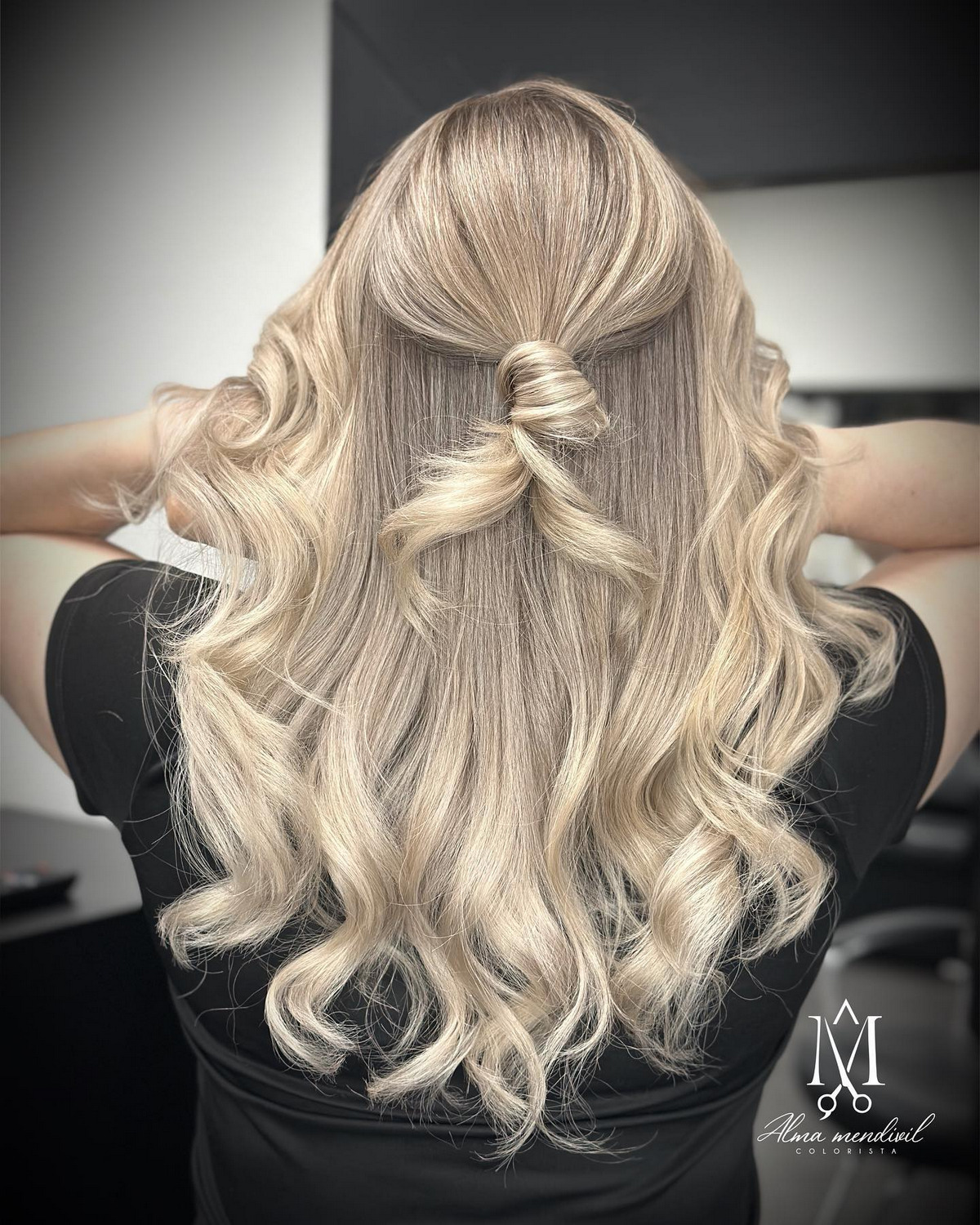 Wavy Platinum Blonde Highlights