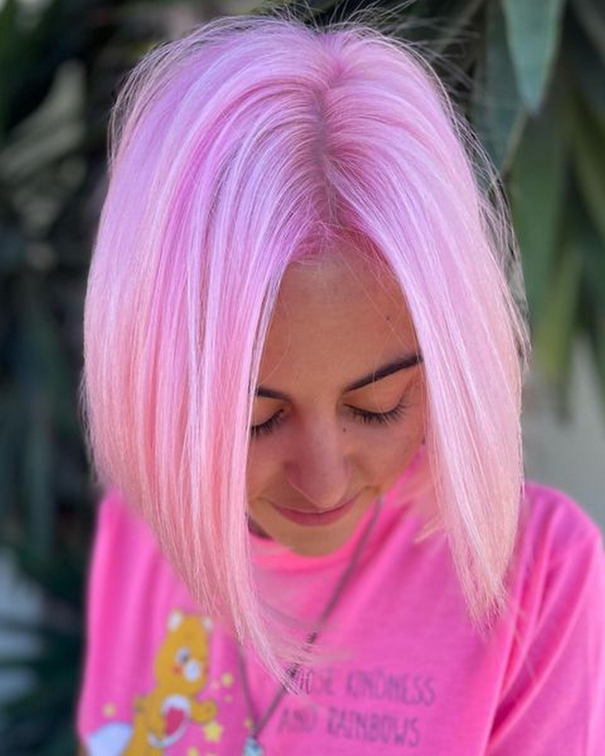 Edgy Platinum Bob With Purple Tint