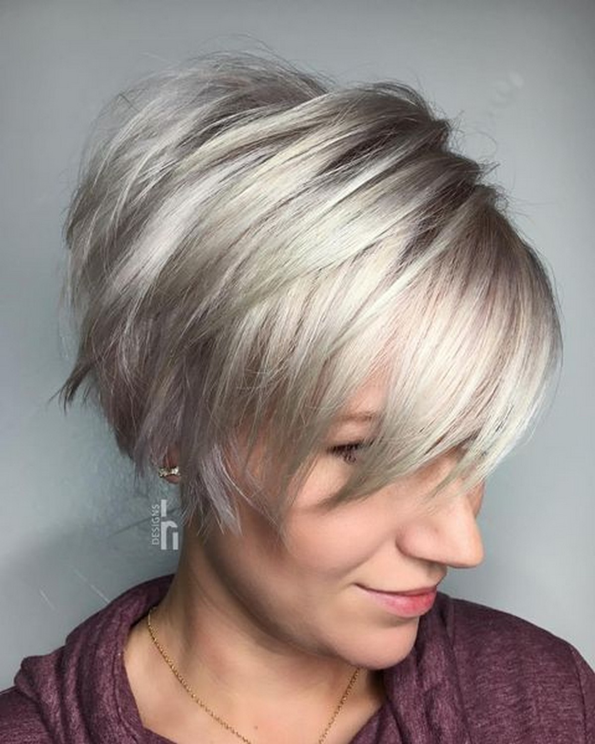 Edgy Platinum Bob With Purple Tint