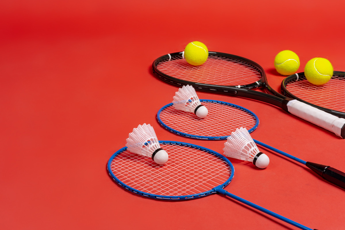 Four Badminton Rackets