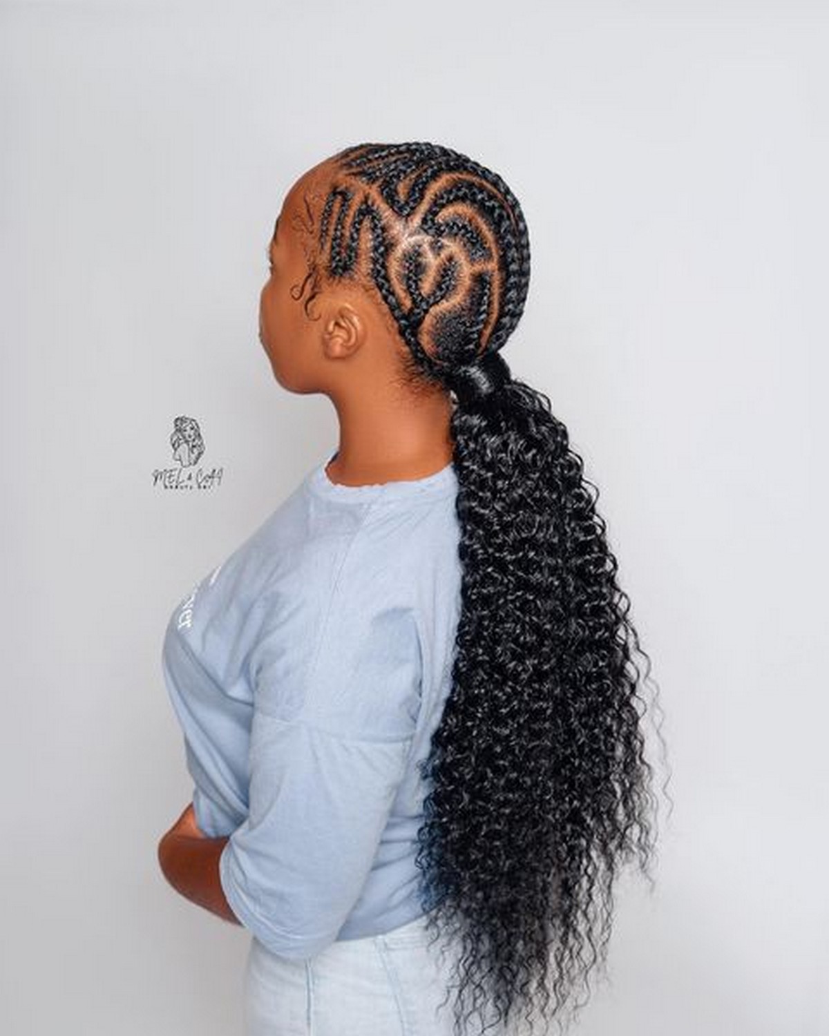Fun Curly Ponytail And Tribal Braids