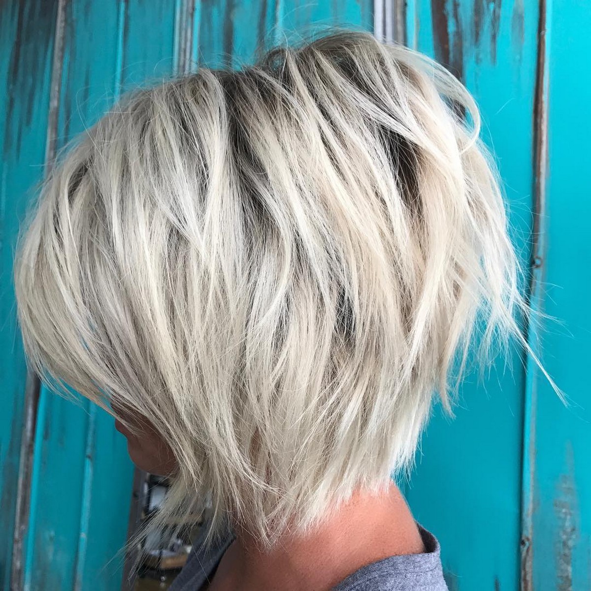 Ash Blonde Layered Bob With Black Roots