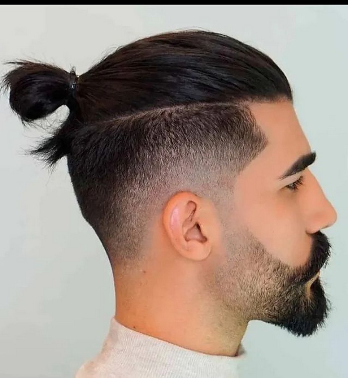 Low Taper Undercut With Bun For Man