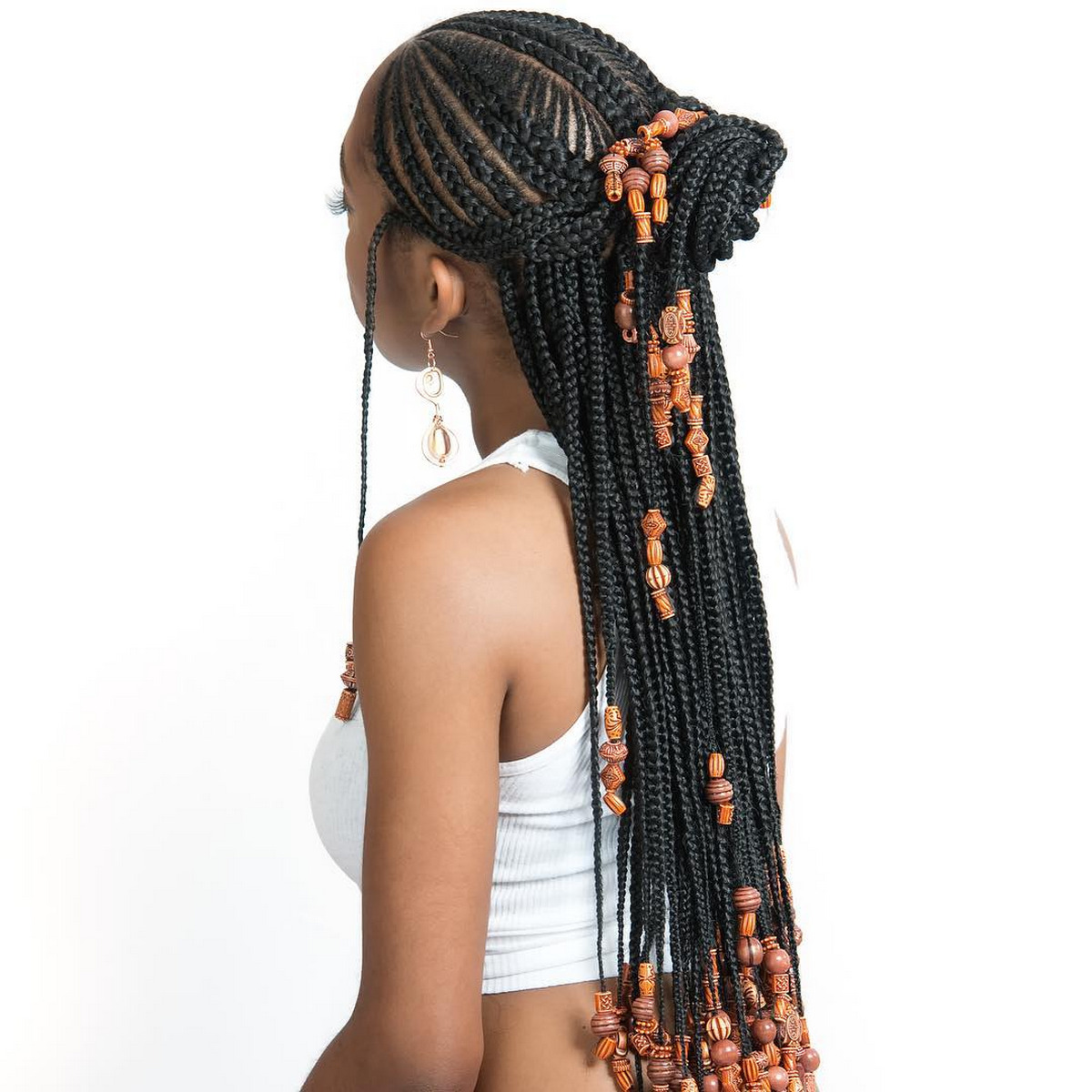 Cornrows With Artistic Beaded Twisted Bun