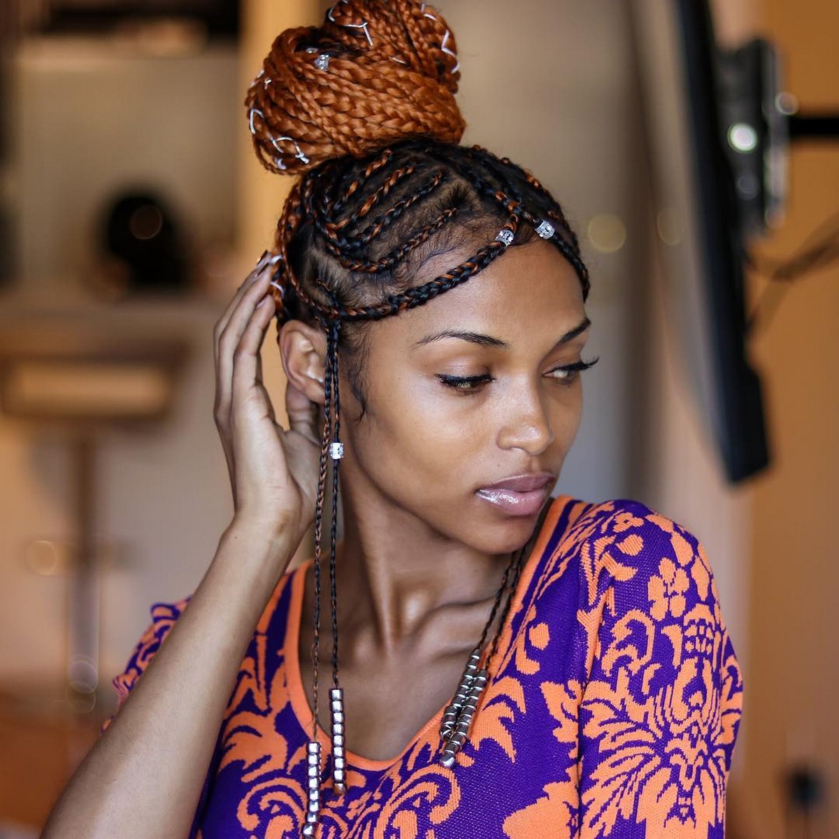 Two-Toned Tribal Braids In A Top Bun