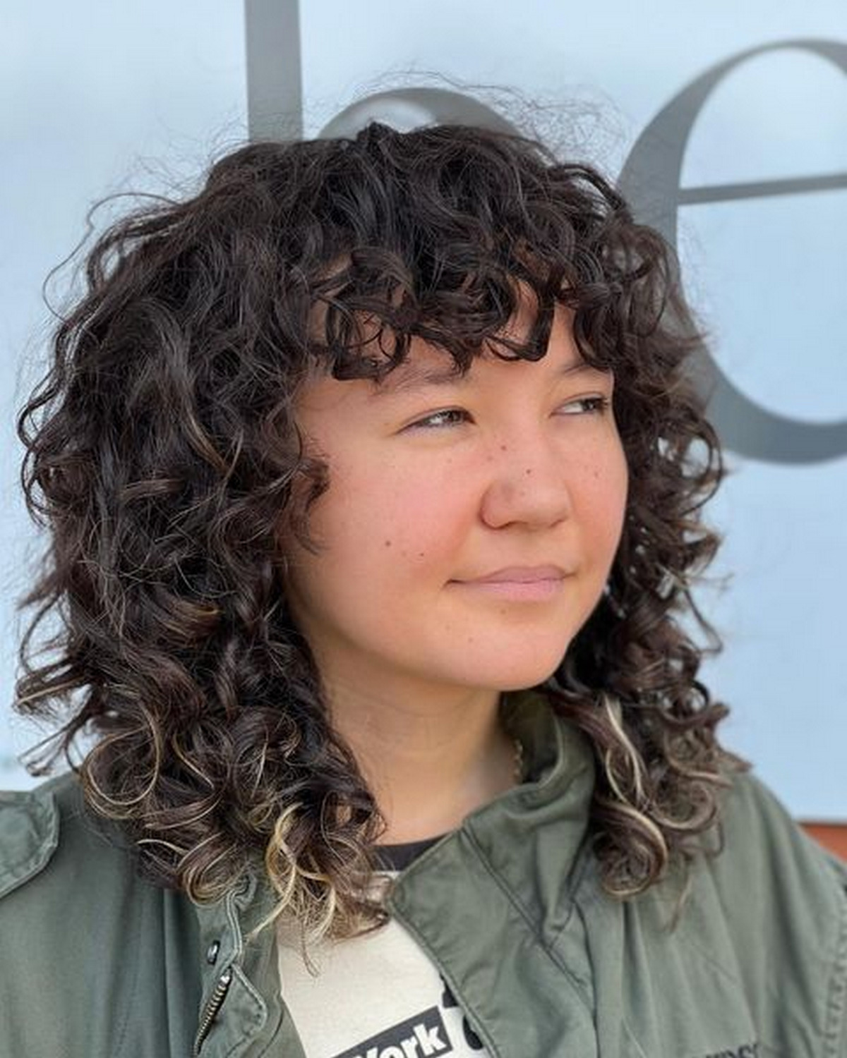 Fluffy Curls And Bangs For Collarbone-Length Hair