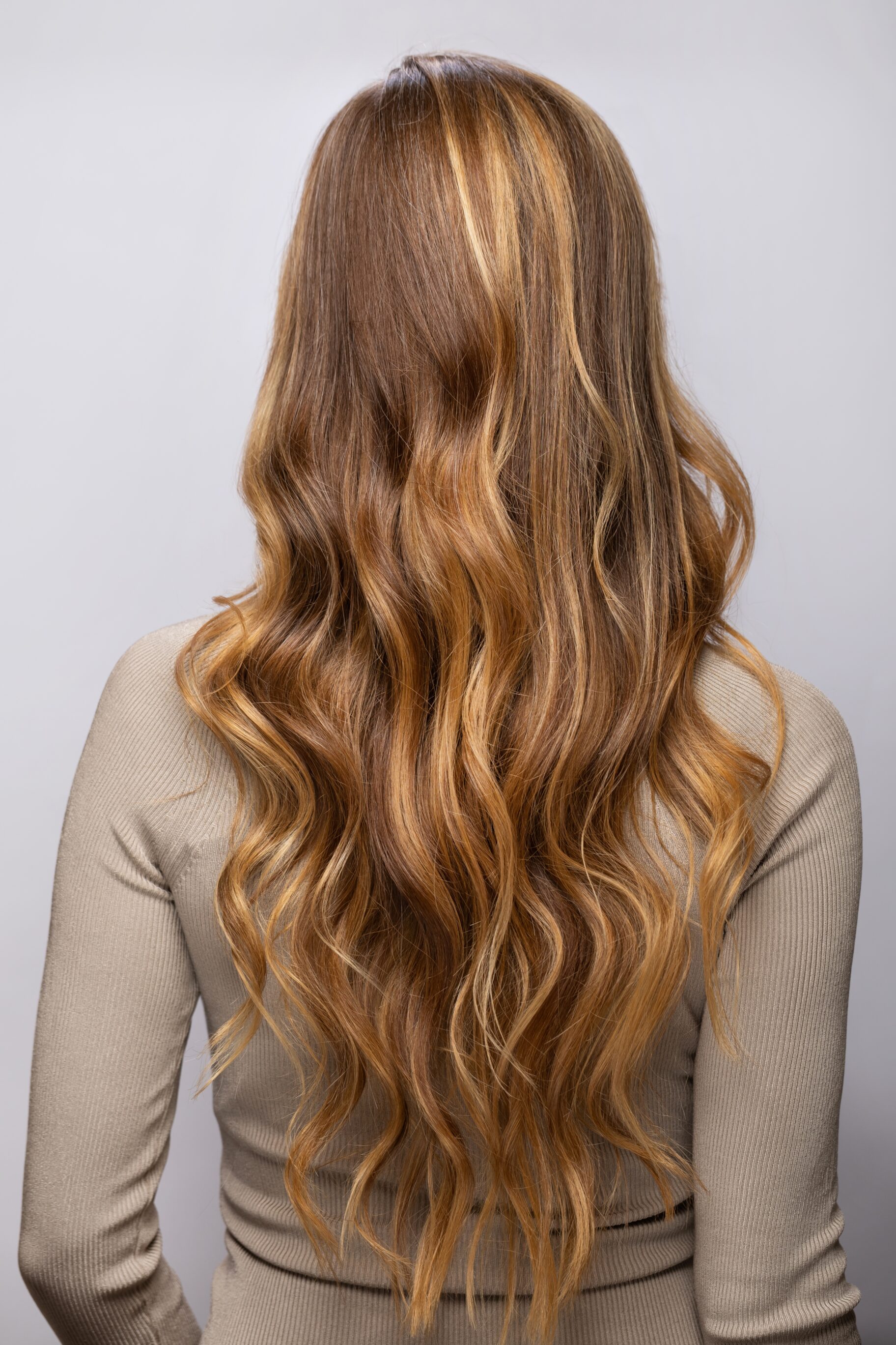 Honey Blonde Balayage With Golden Streak