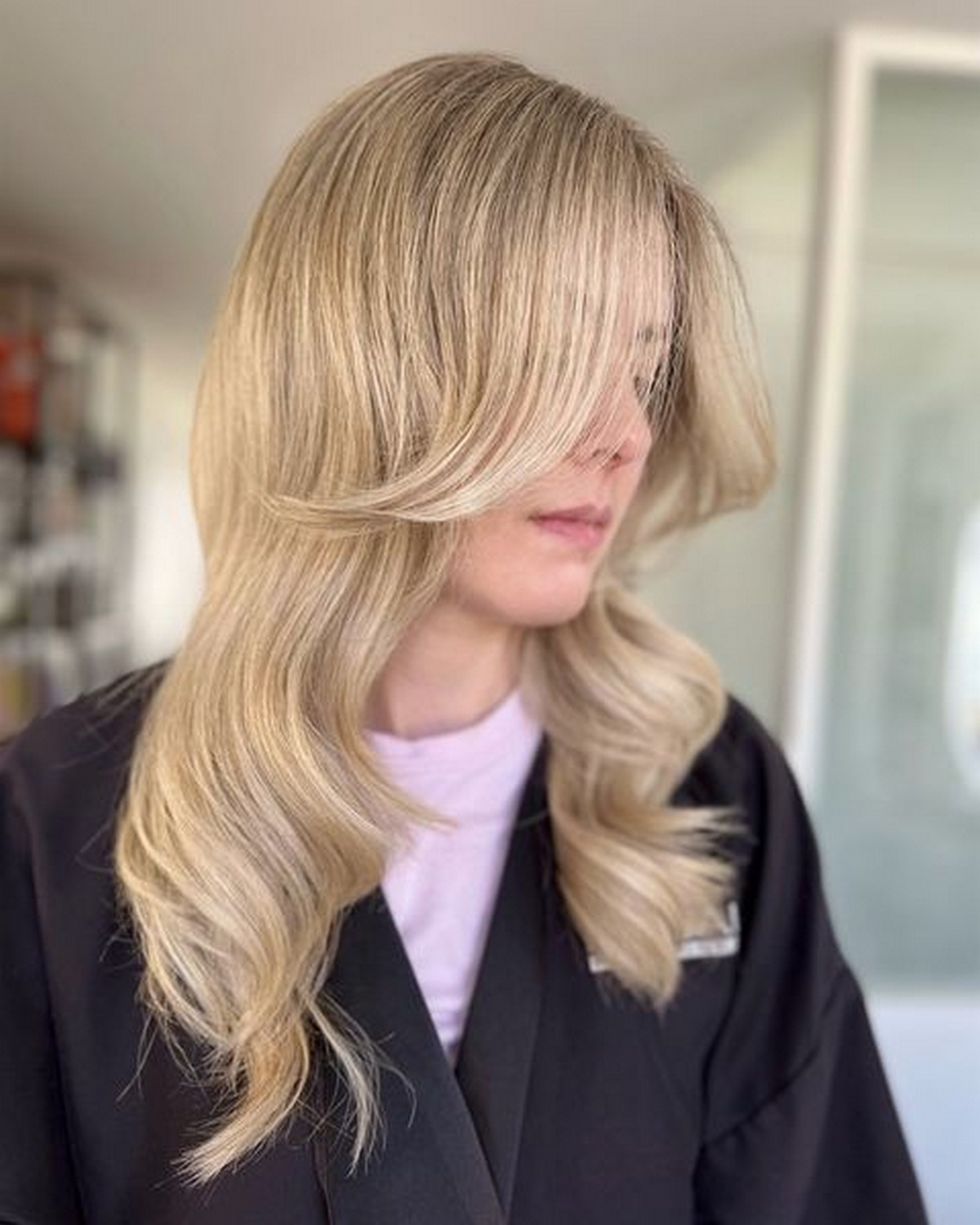 Perfect Blonde Layered, Wavy with Curtain Bangs