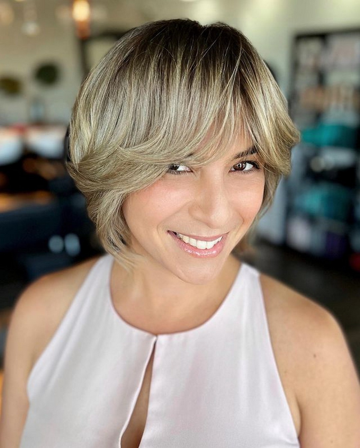 Neat Pixie Haircut With Long Bangs