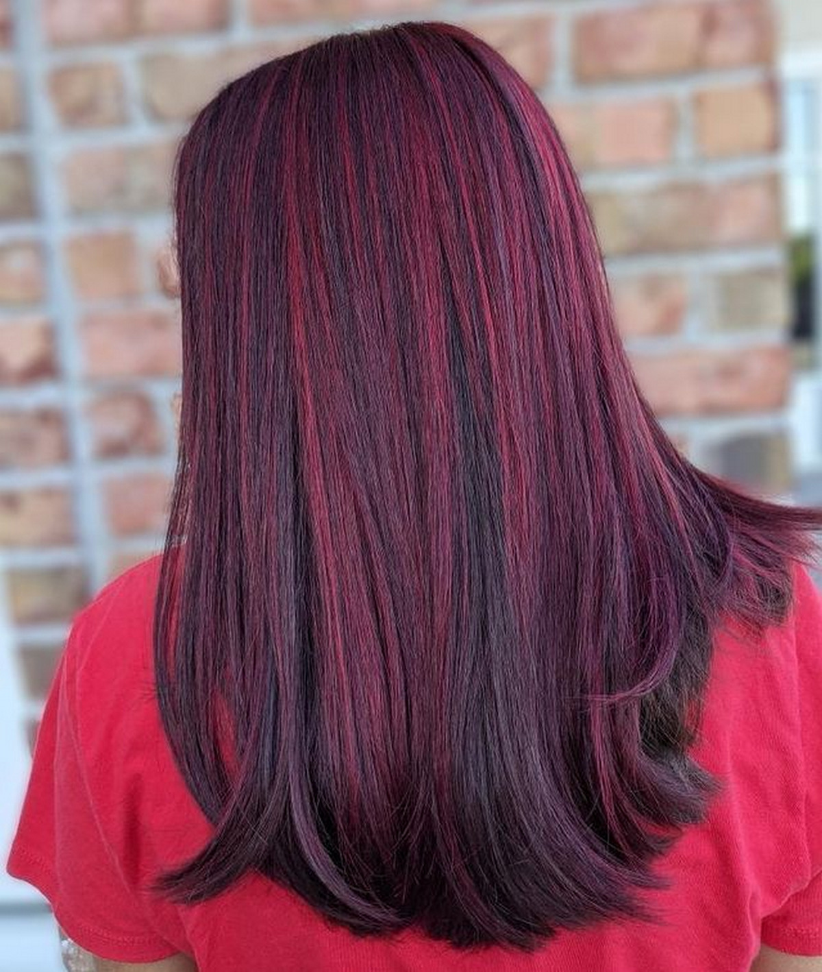 Straight Black Hair With Red Violet Highlights