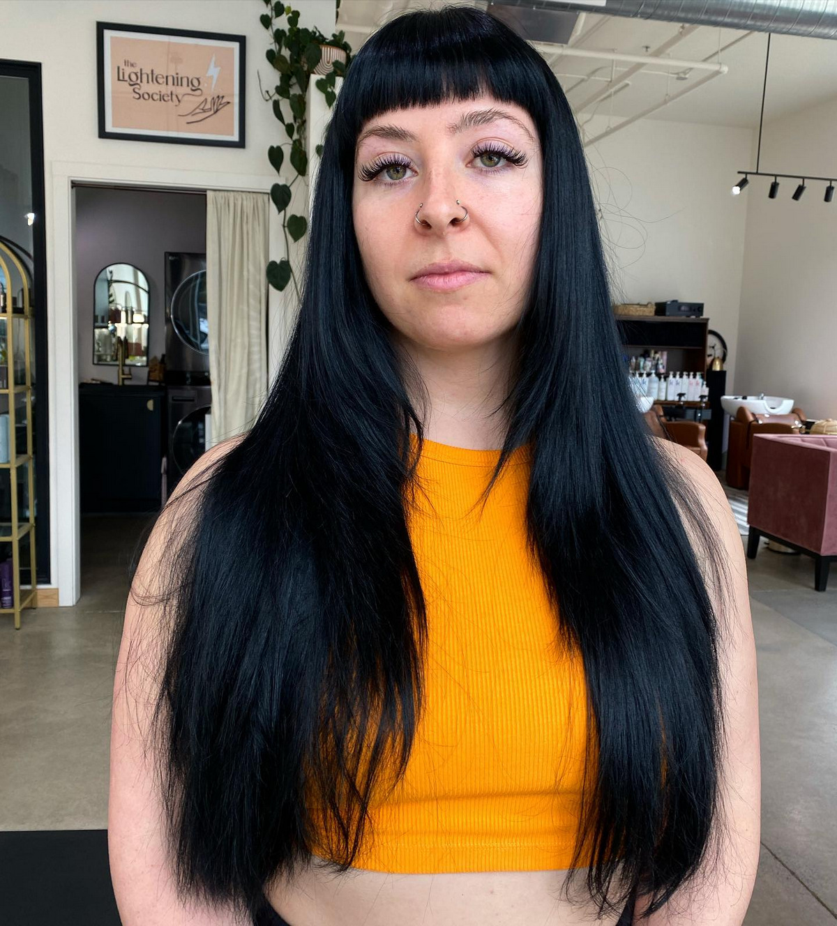Straight, Sleek Black Hair With Blunt Bangs