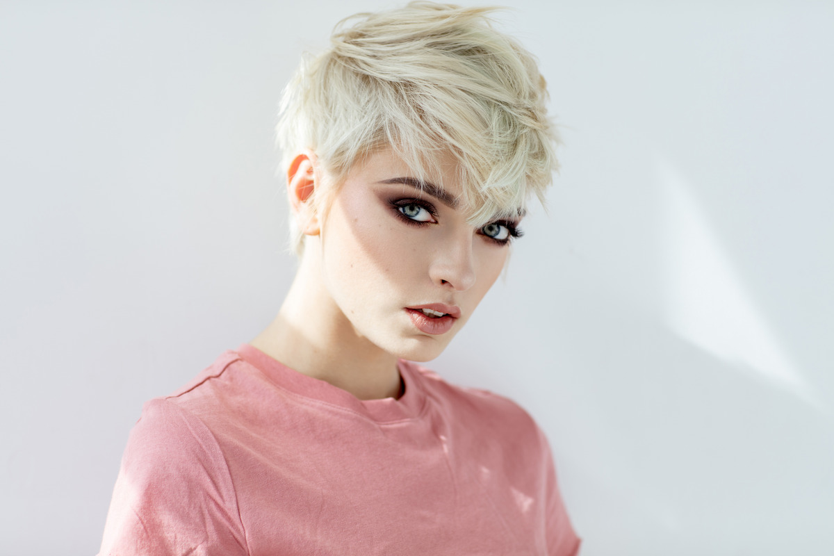 White Pixie Cut Hair With A Layer Of Bangs