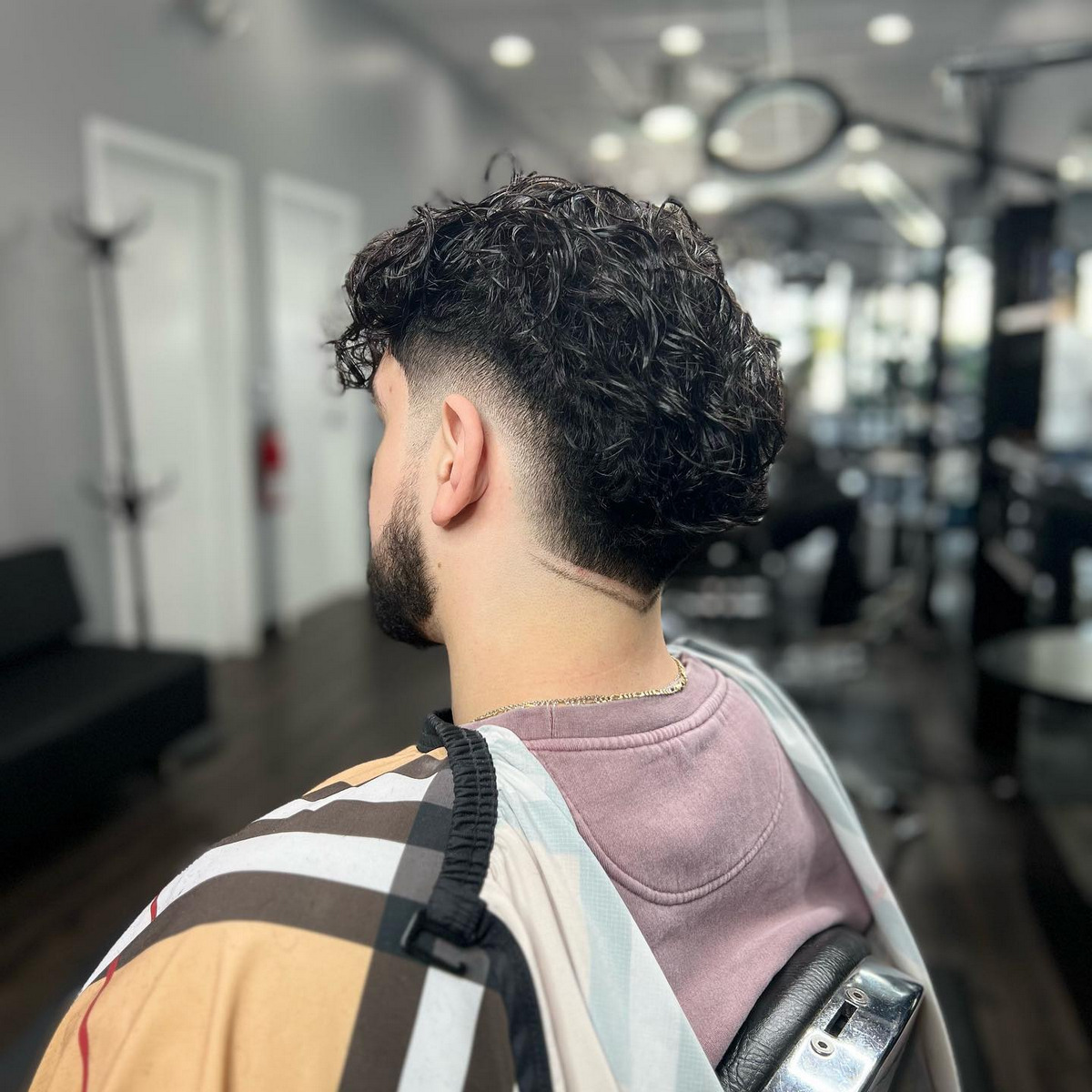 High Fade With Curly Mullet