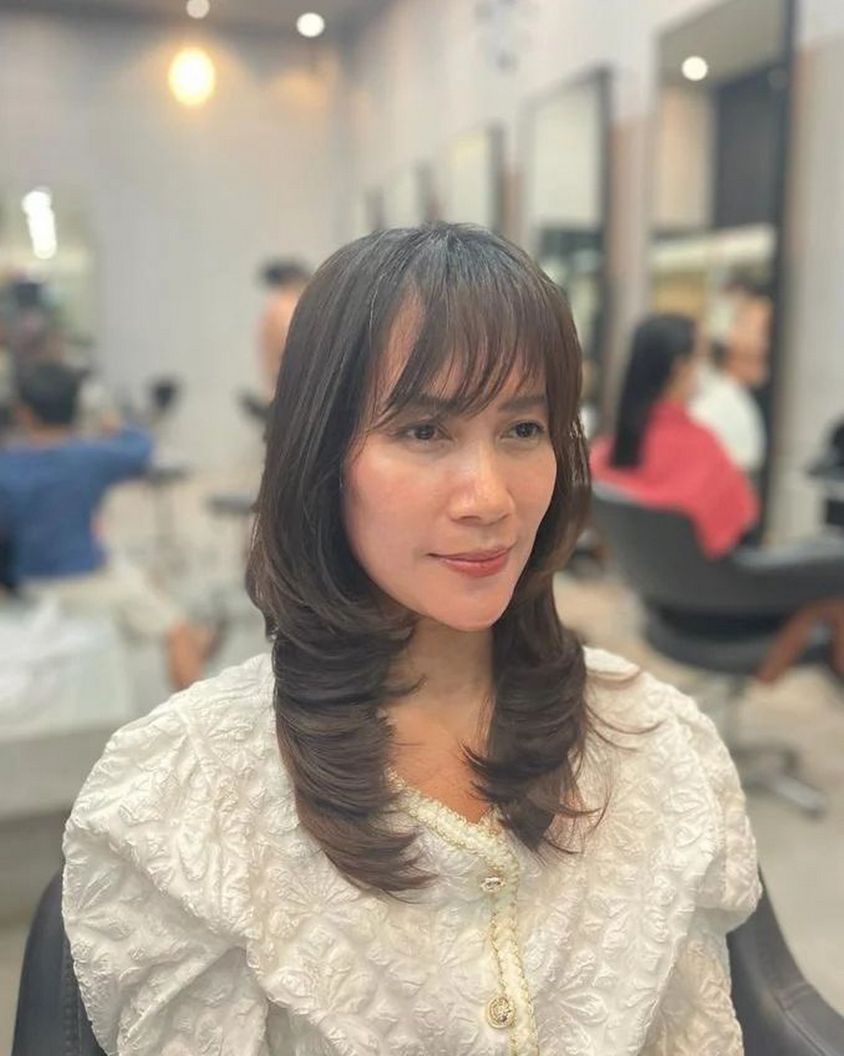 Long Layered Bob With Wispy Bangs