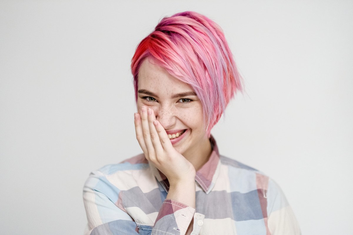 Pink Highlight Pixie Cut With Side Swept Bangs