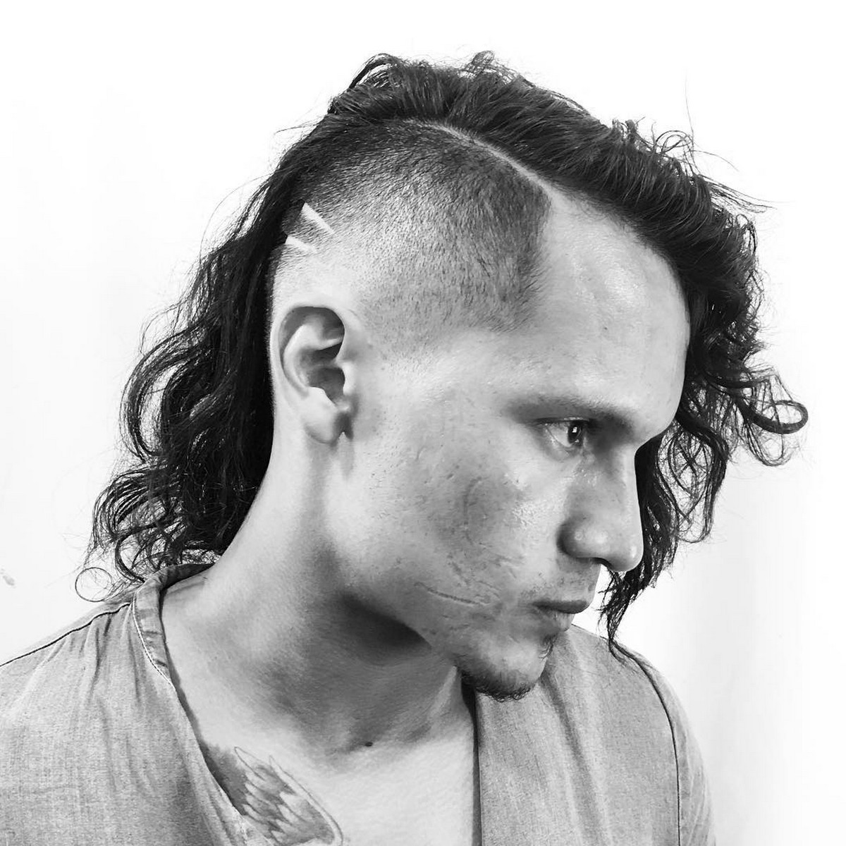 Long Wavy Haircut With One Side Shaved Mullet