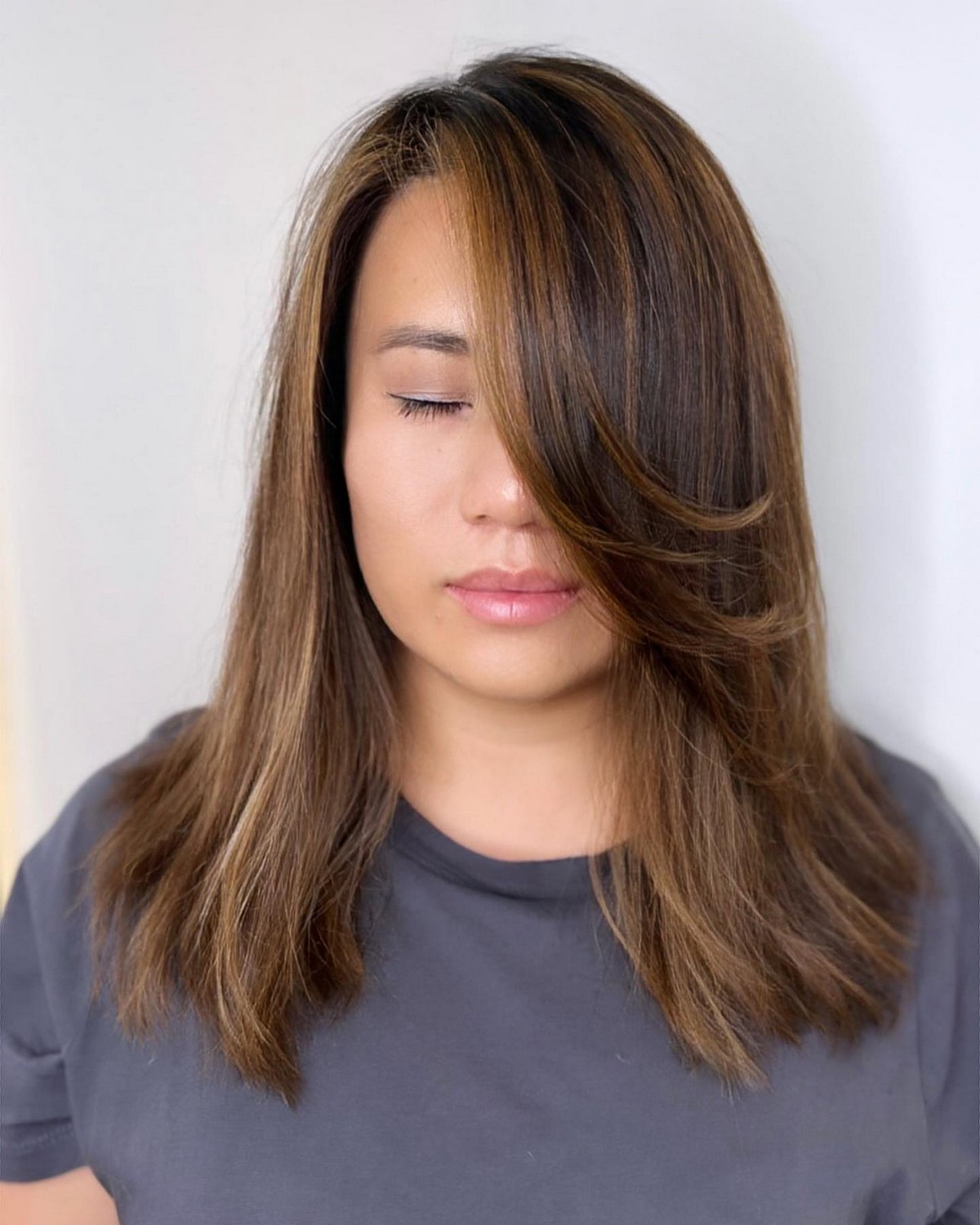 Depth Blunt Cut With Long Side Swept Bangs