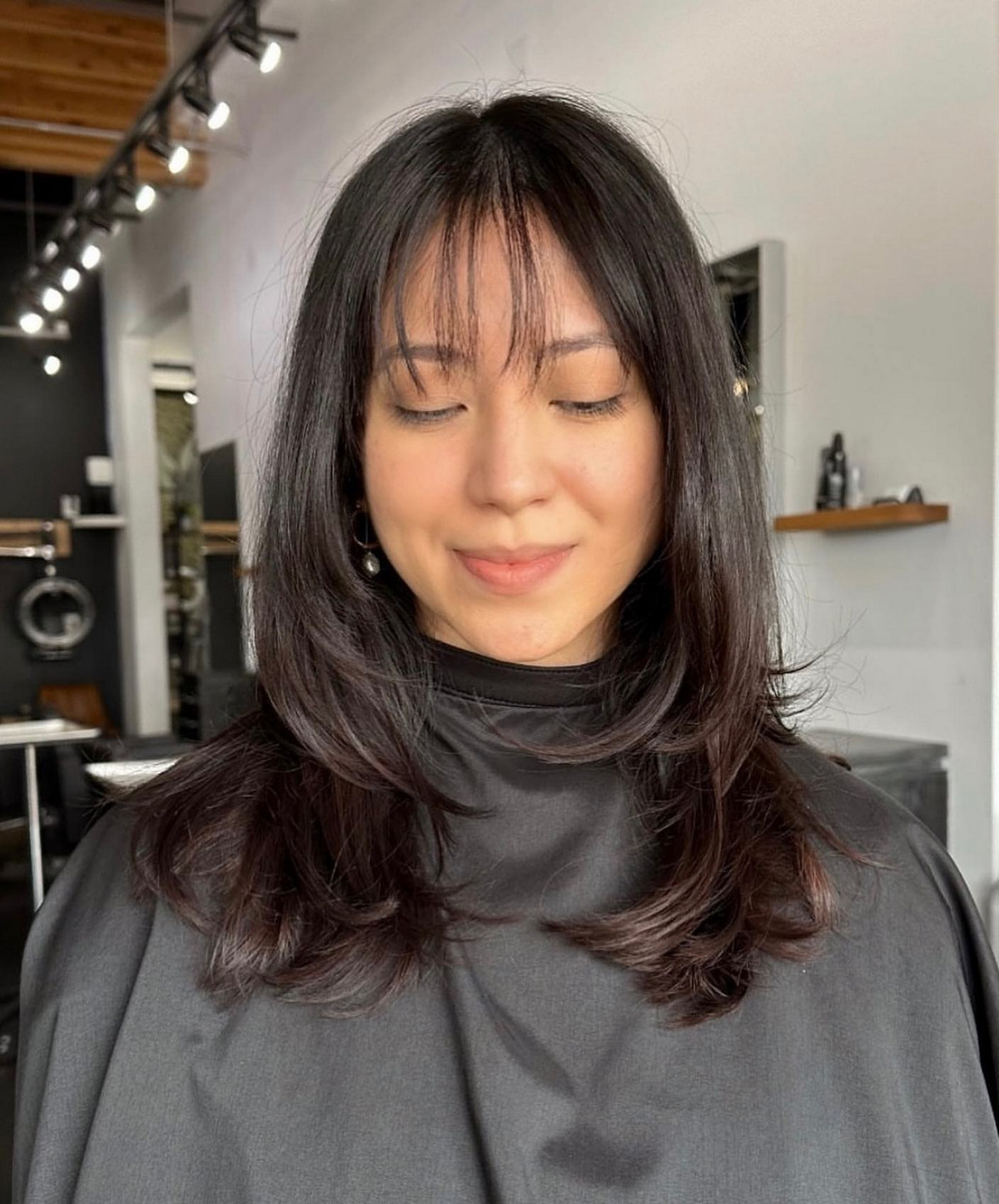 Double-Layered Haircut With Wispy Bangs