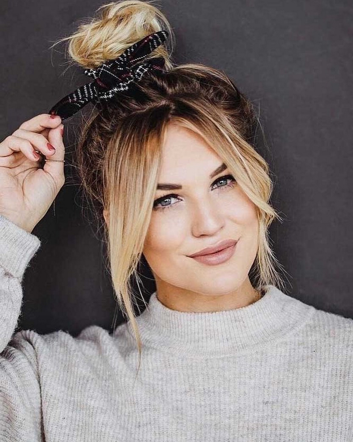 High Bun with Middle-Parted Bangs