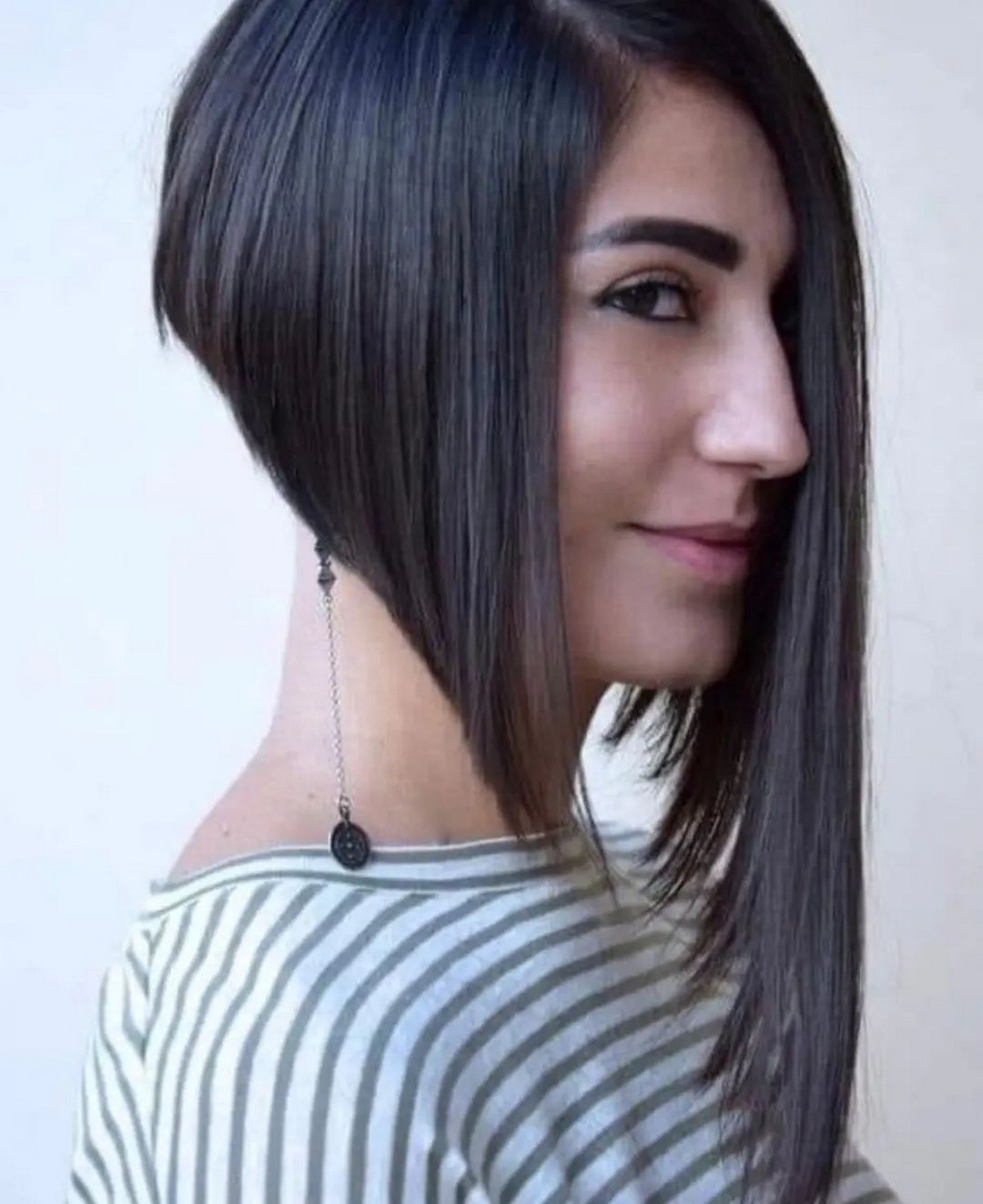 Asymmetrical Undercut Bob Hair Cut Short At The Back
