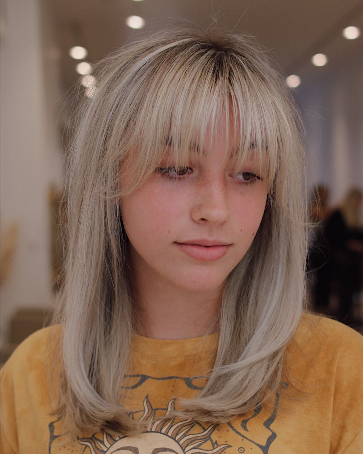 Bright Blonde Mid-Length Hair With Wispy Bangs