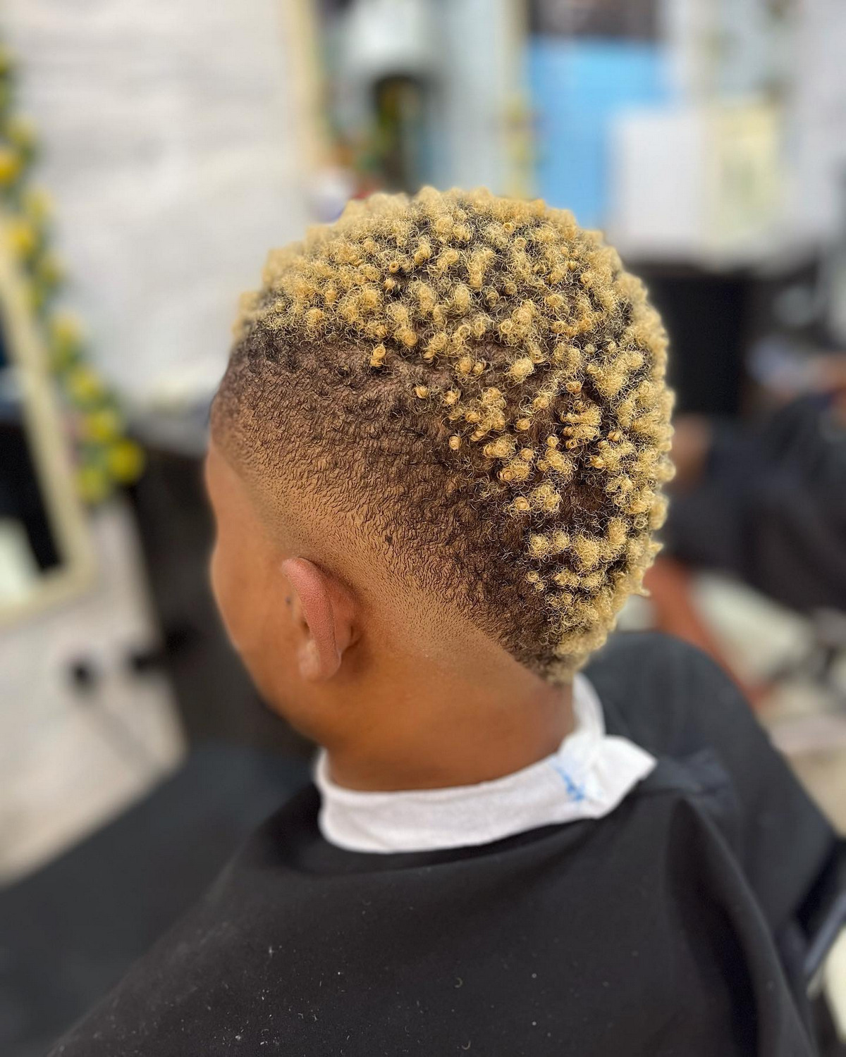 Blonde Mohawk Haircut And Temple Fade