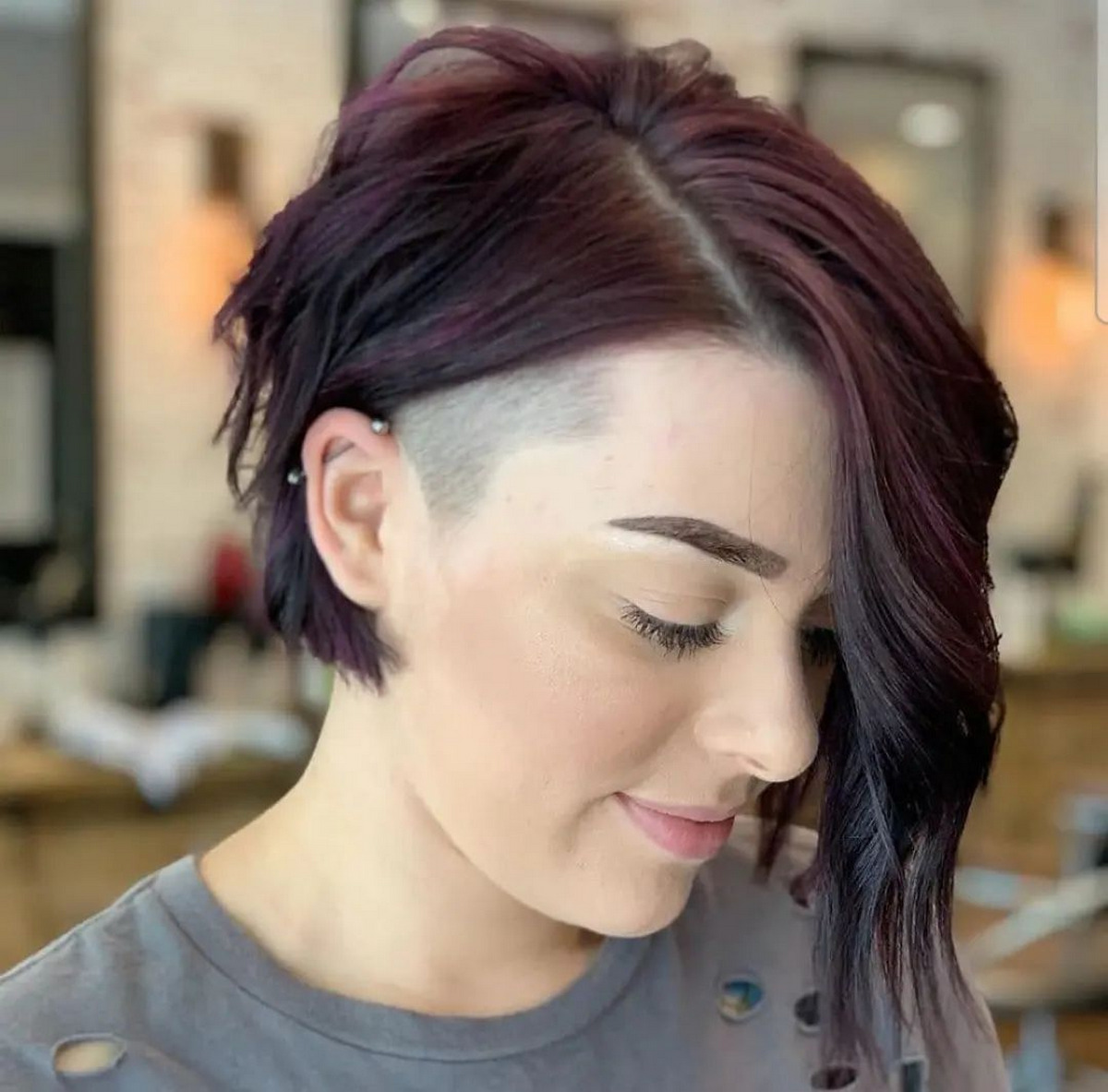 Undercut Bob With A Shaved Side And Long Side Bangs
