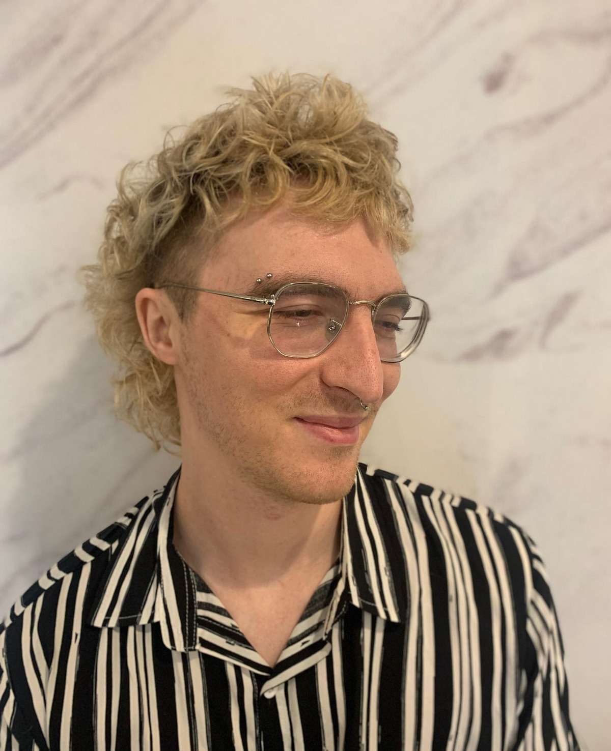 Blonde Curly Mullet With Bald Fade