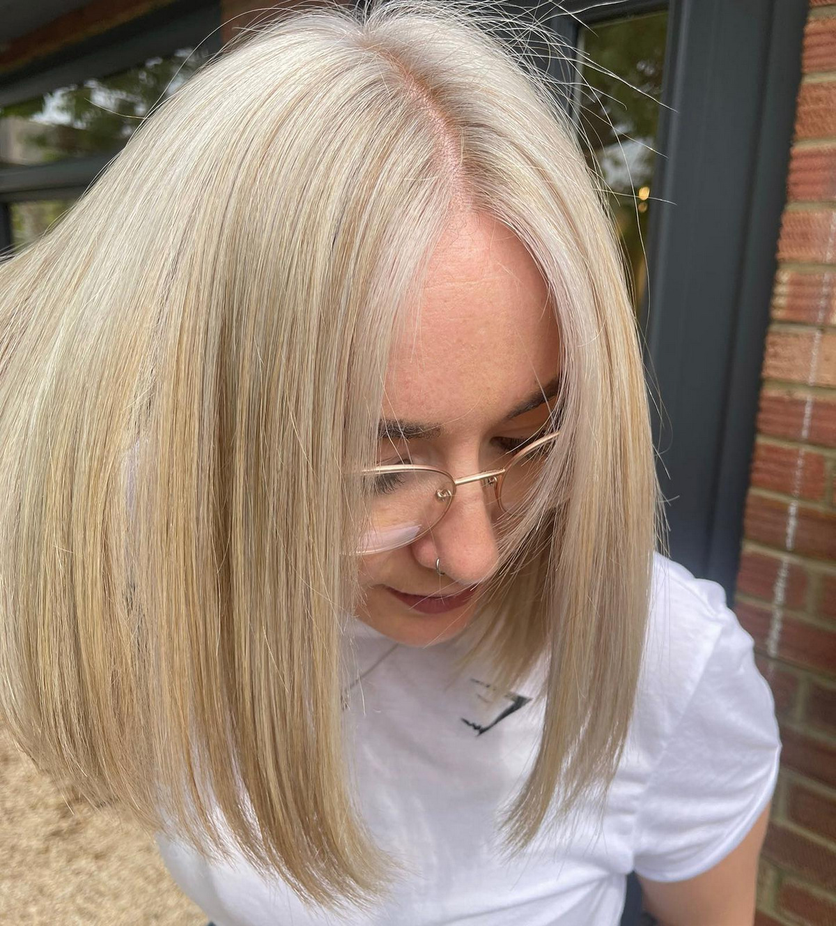 Sleek Blonde Bob With Middle Part