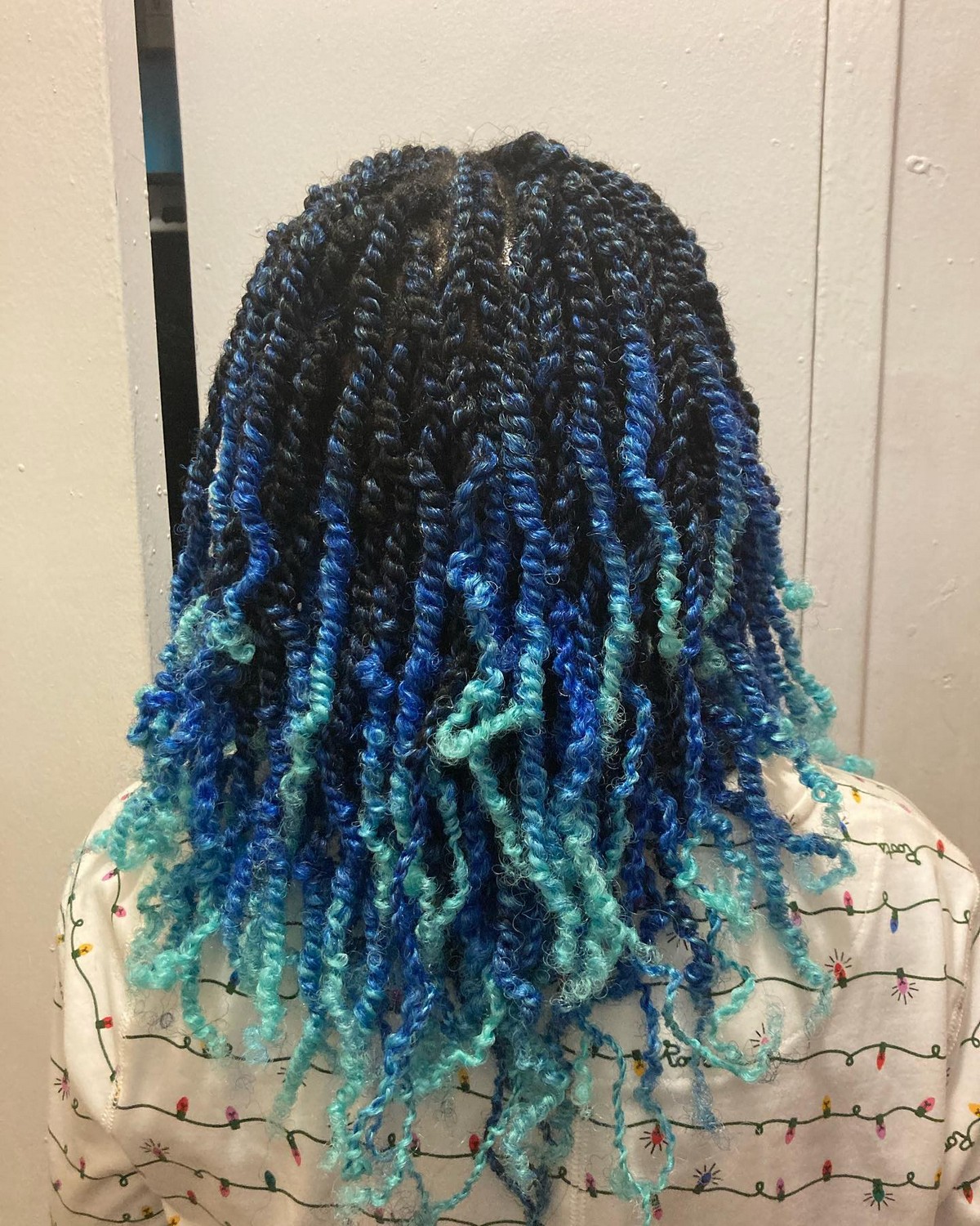 Blue-Green Twisted Protective Style With Dark Root