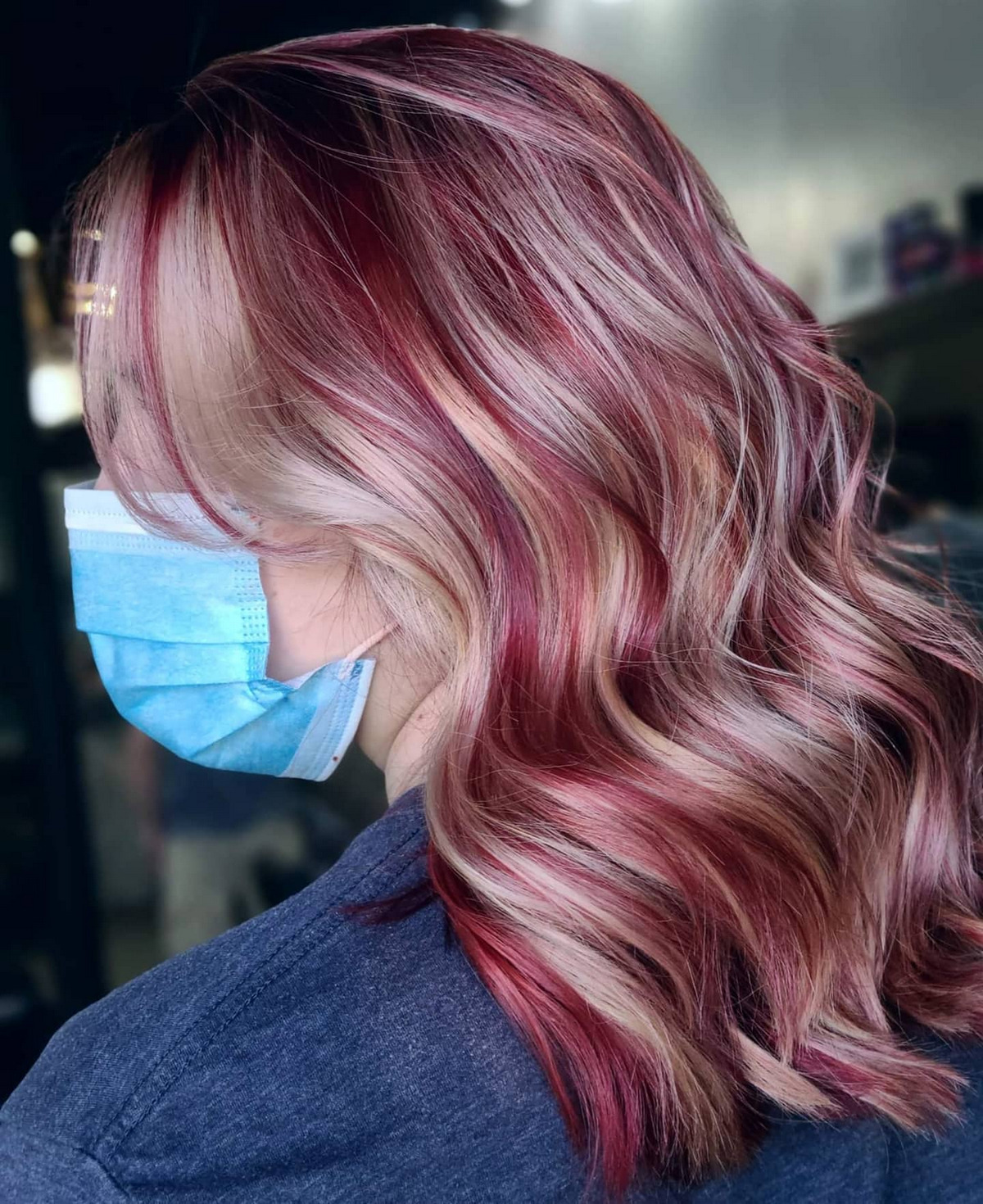 Plum Red Streaks In Blonde Hair