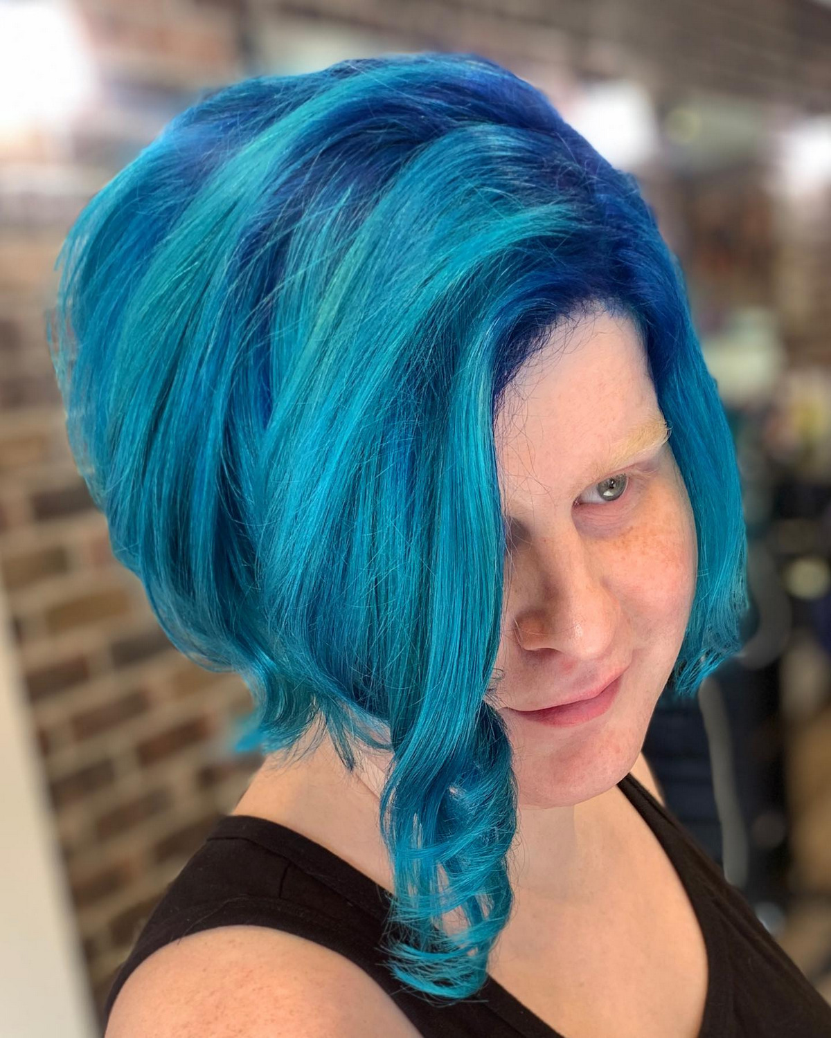Blue Undercut Bob With Long Side Bangs