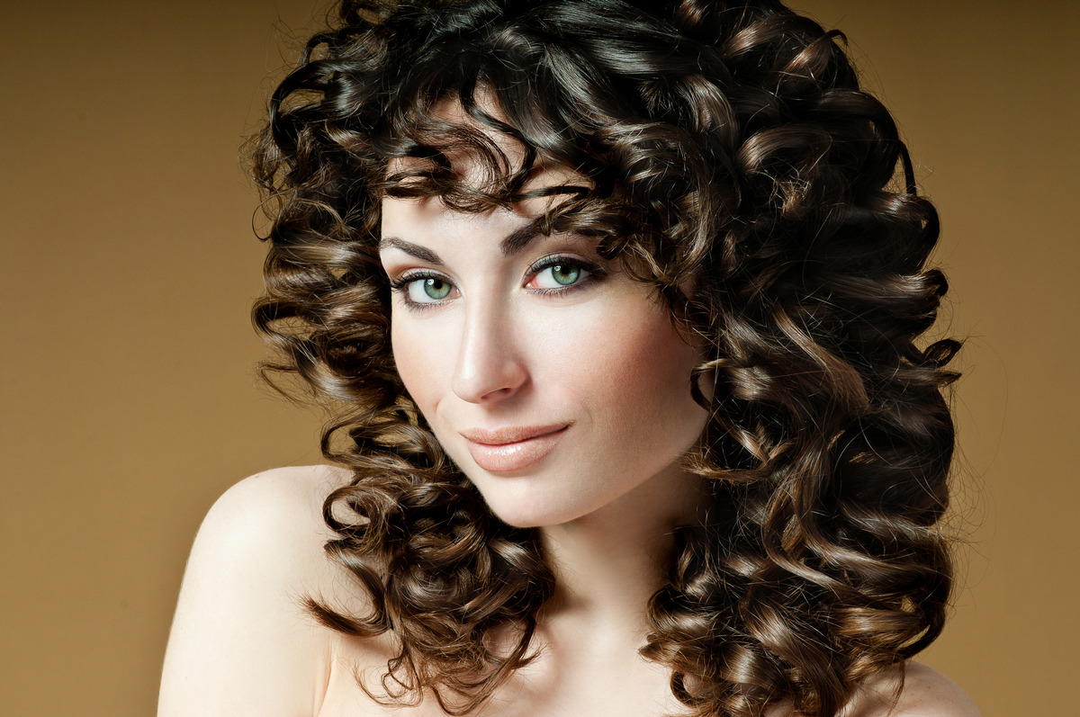 Brunette With Gorgeous Big Curl Hair And Bangs