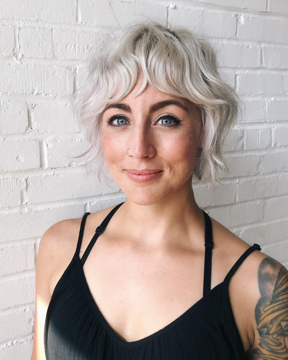 Icy White Curly Layer Bob With Bangs