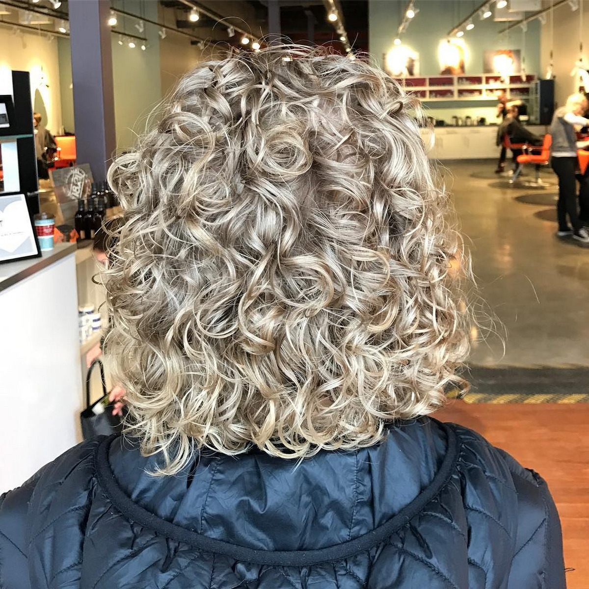 Medium Ash Blonde Perm Hairstyle