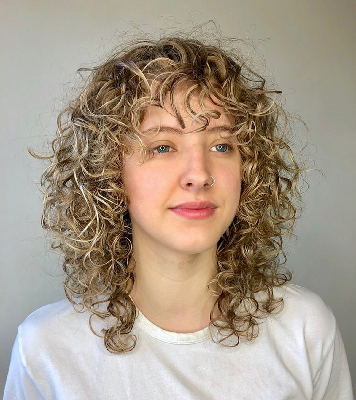 Medium Layered Curls with Curl Bangs