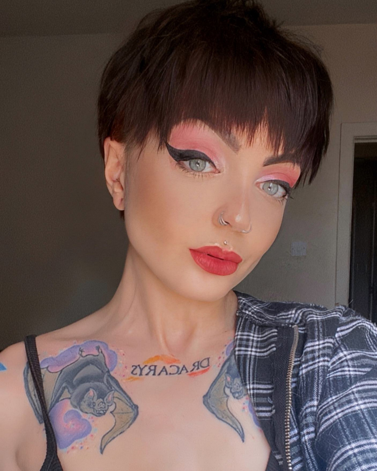 Brunette Pixie Cut With Blunt Bangs