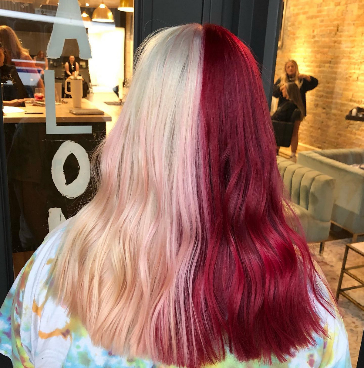 Layered Blonde Hair With Red Highlight On One Side