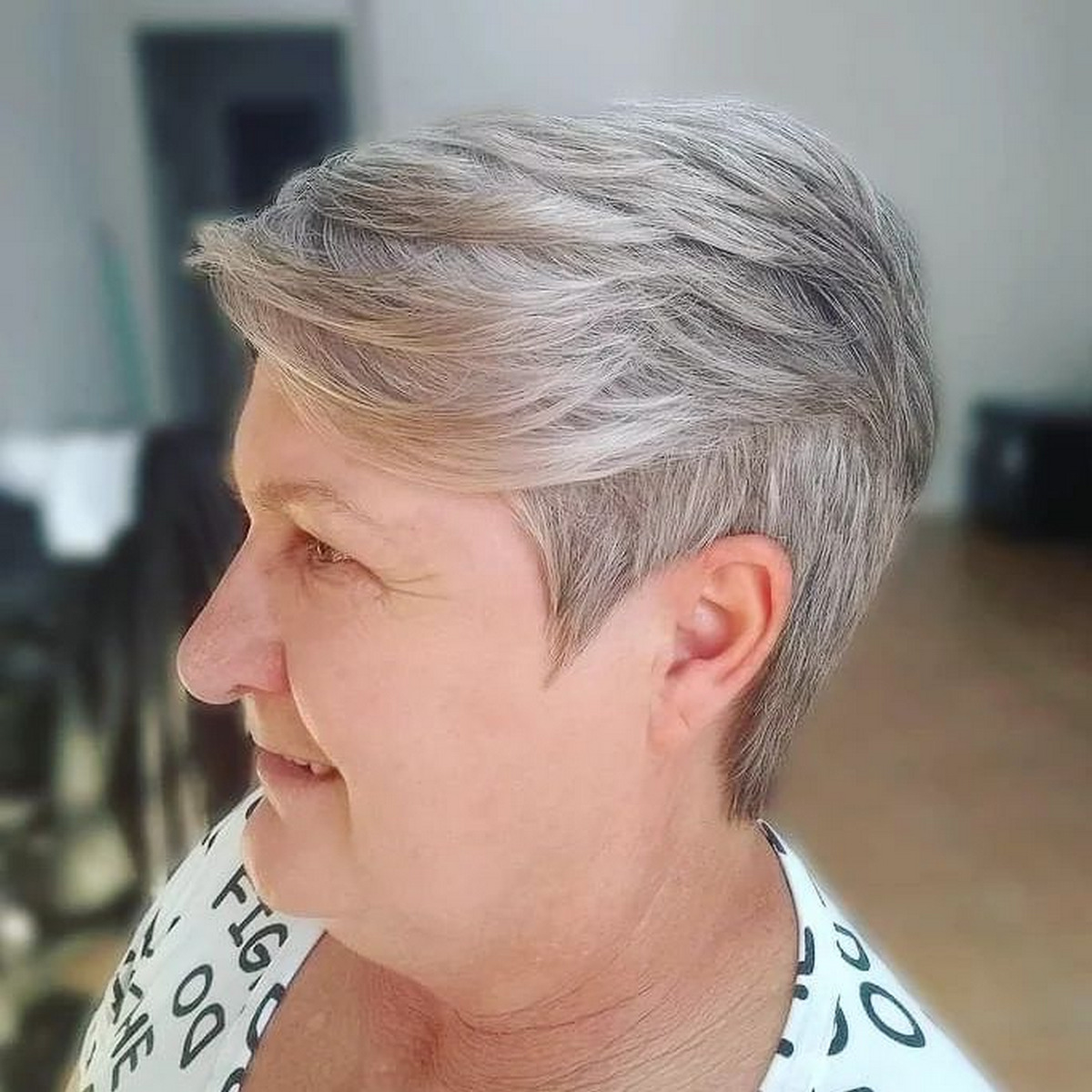 Pepper Color Pixie With Feather Bangs For Older Women