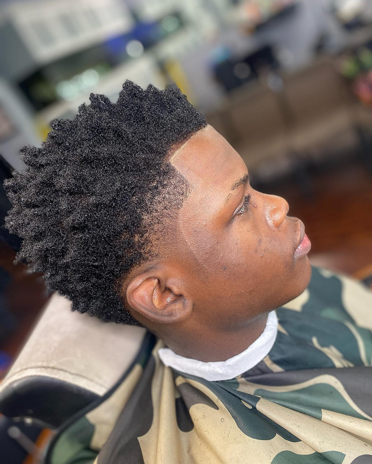 Twisted Curls With Blowout Fade Haircut