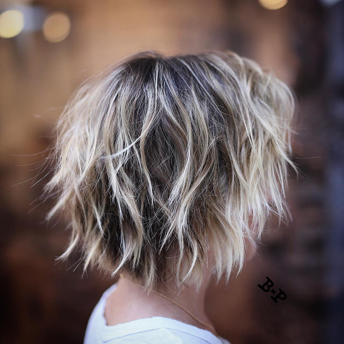 Blonde Shaggy Hair With Dark Roots