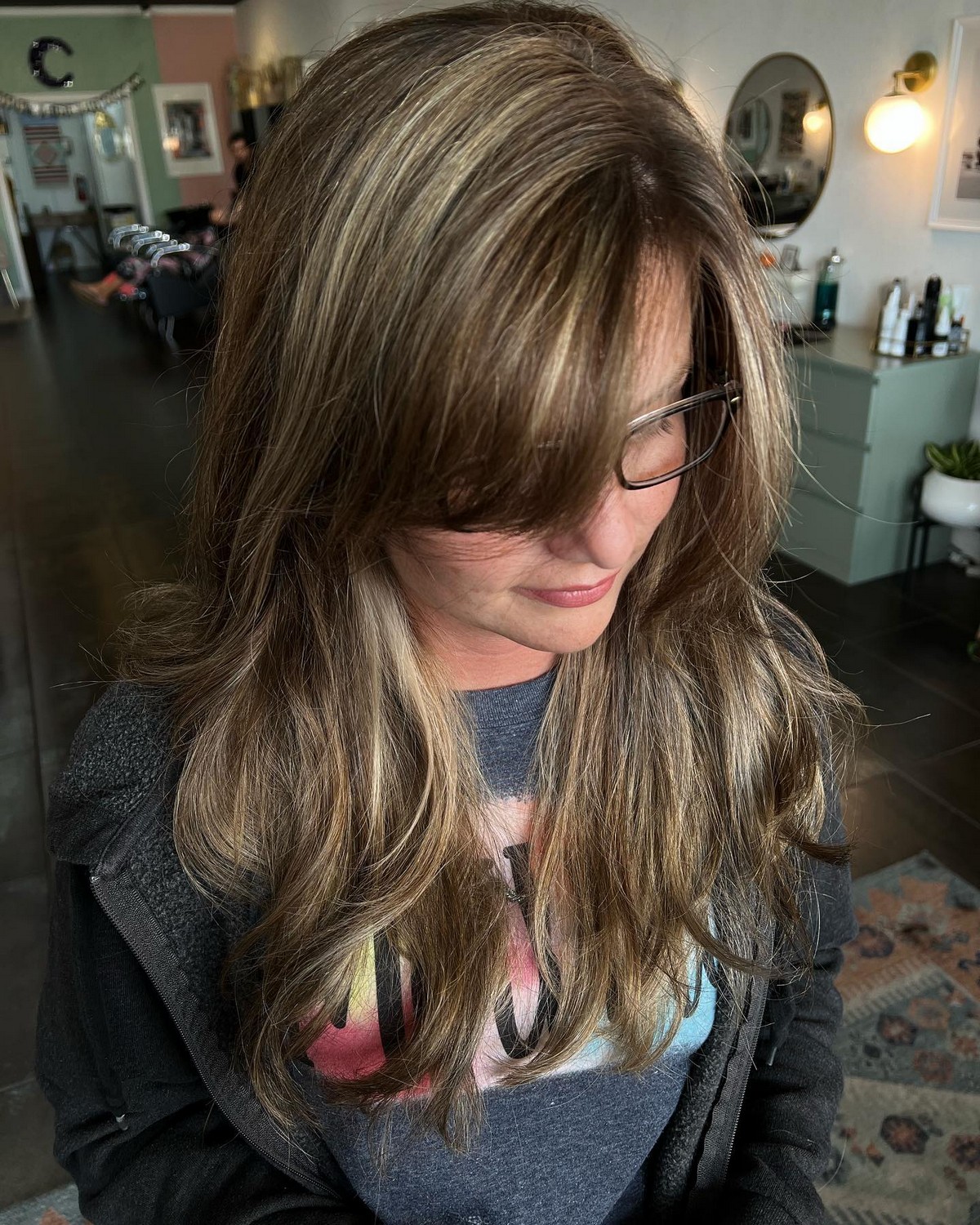 Shag With Side-Swept Bangs And Highlights